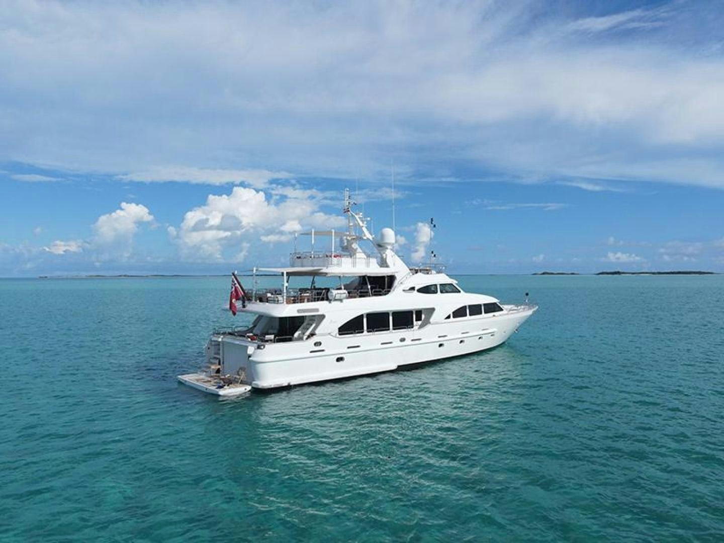 a white boat in the water aboard BW Yacht for Sale