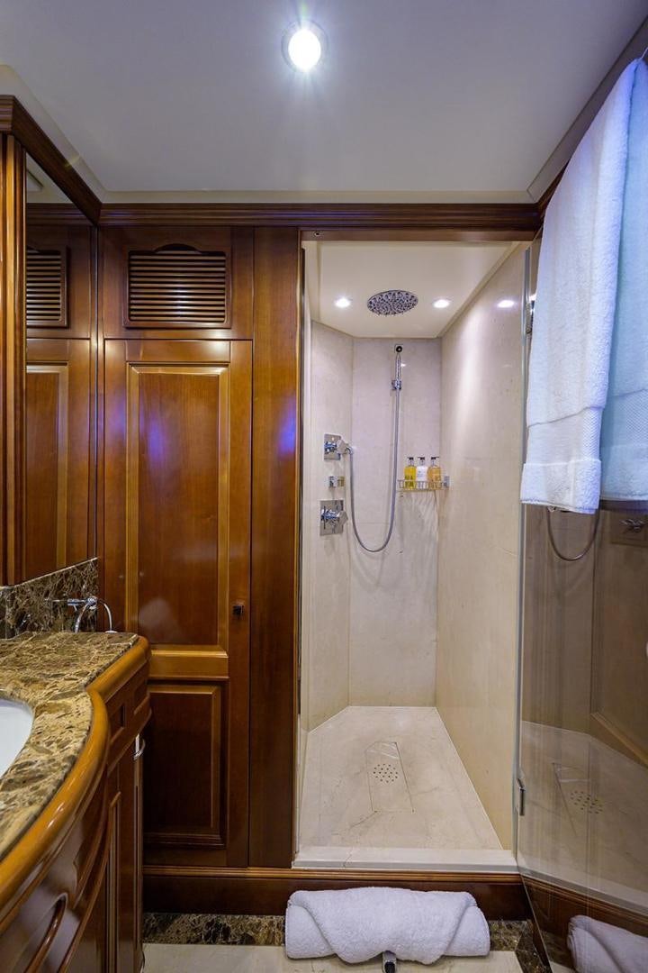a bathroom with a shower and sink aboard BW Yacht for Sale