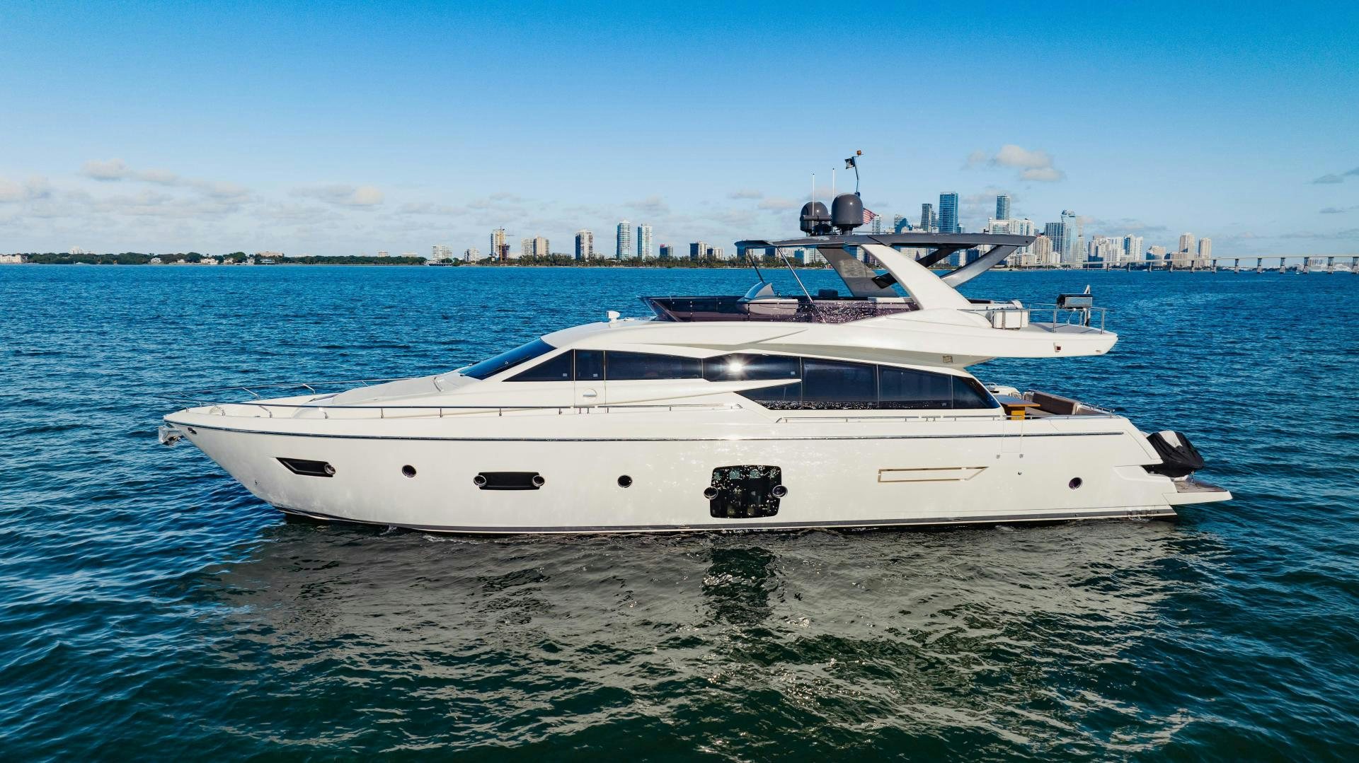 a white yacht in the water aboard SAMI KAY III Yacht for Sale