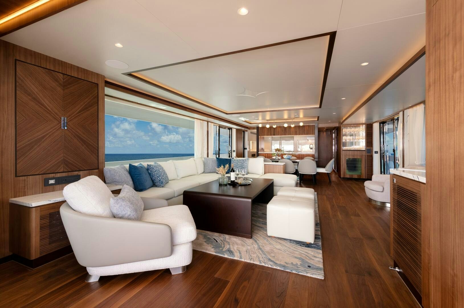 a living room with a large window aboard FD100 911 Yacht for Sale