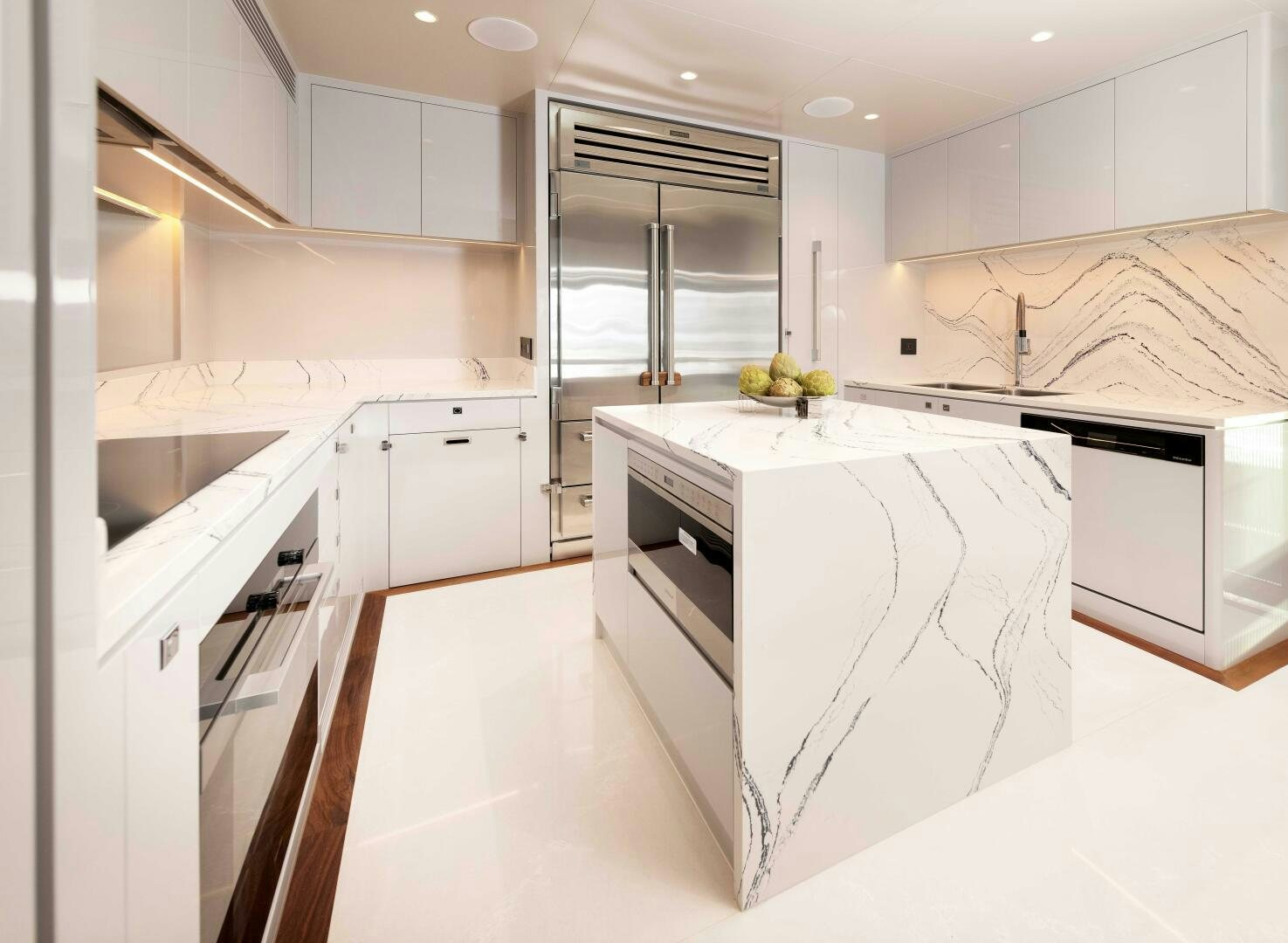 a kitchen with white cabinets aboard FD100 911 Yacht for Sale