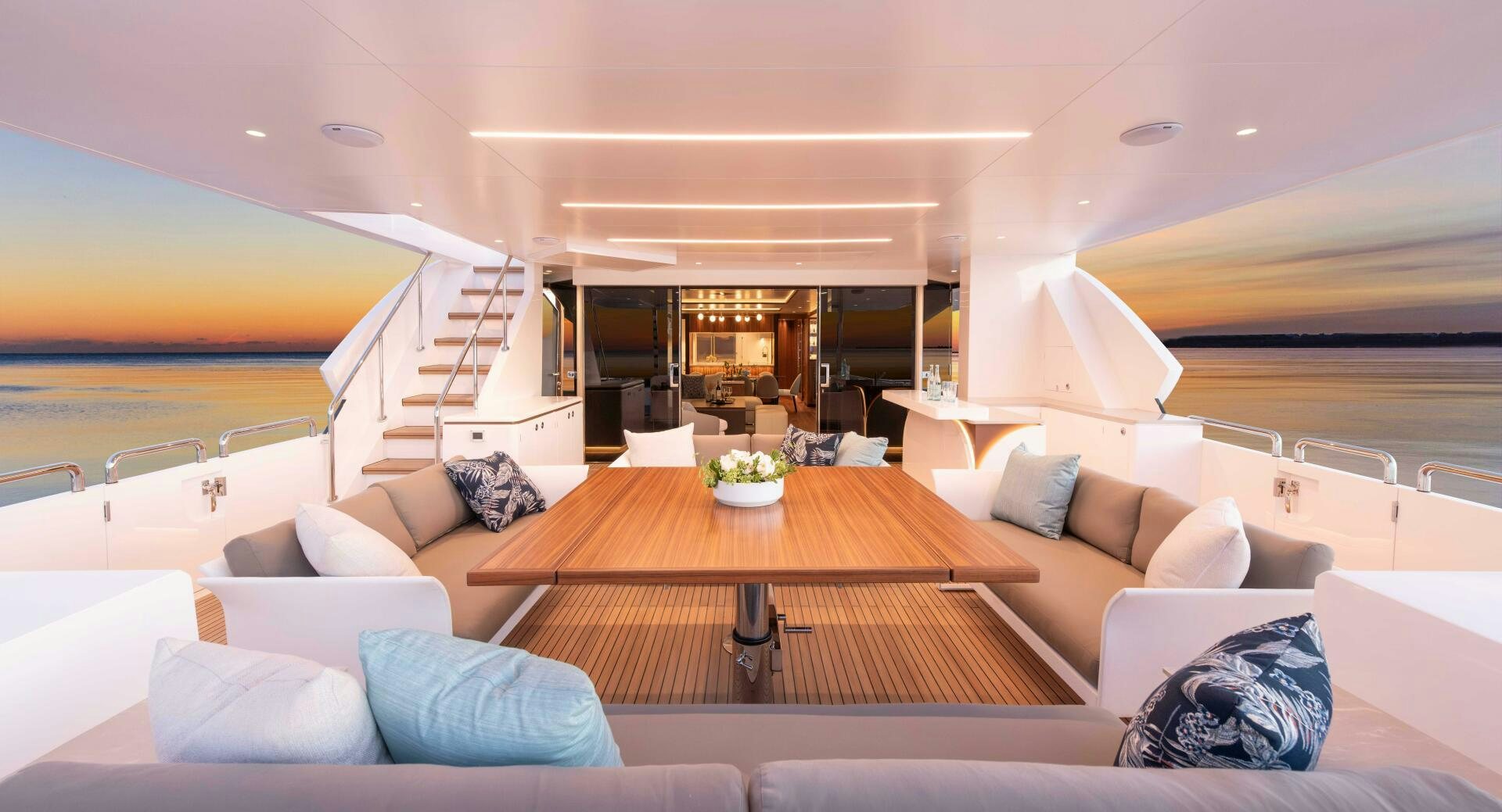 a living room with a large open door aboard FD100 911 Yacht for Sale