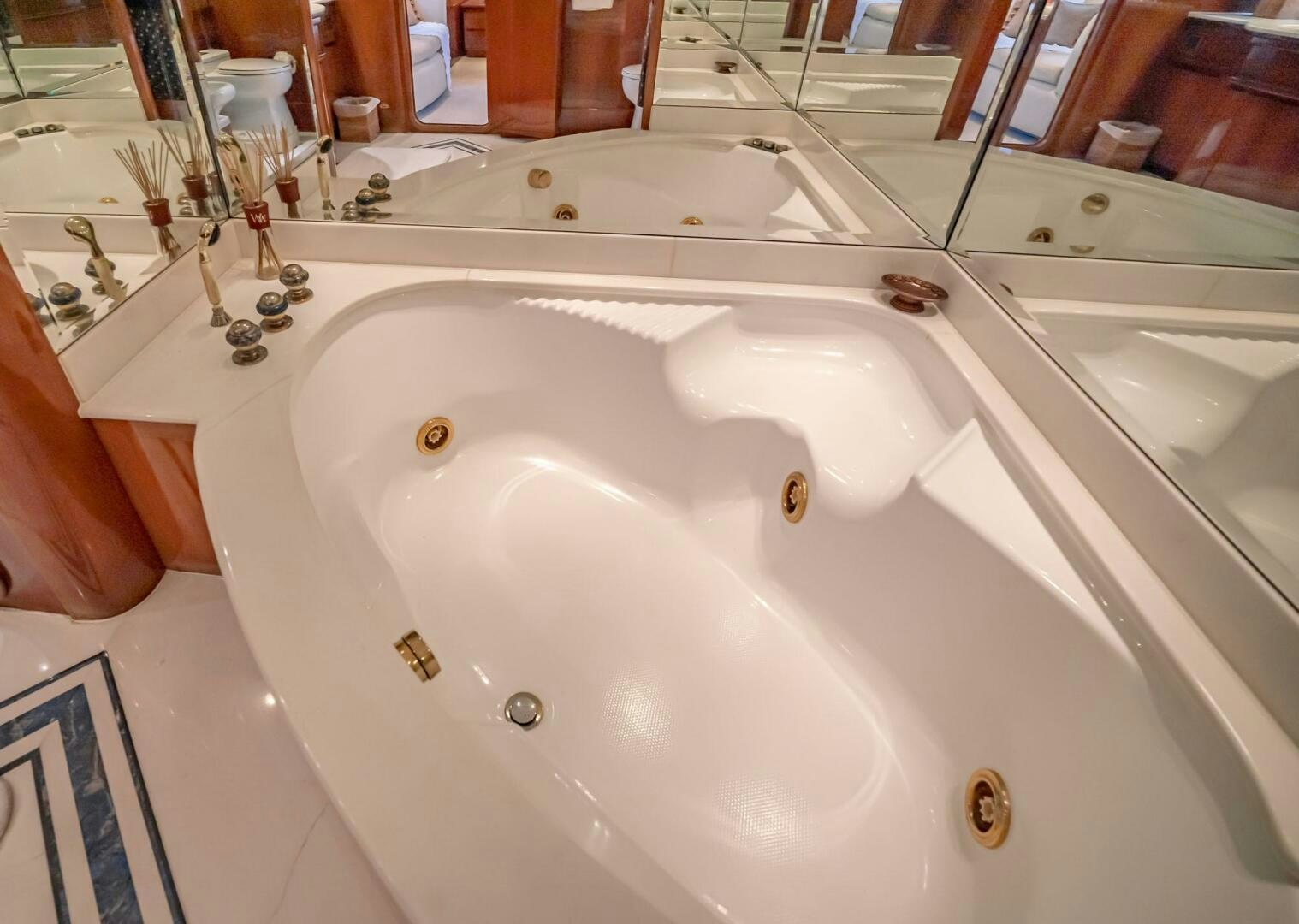 a white sink with a faucet aboard SHALIMAR Yacht for Sale