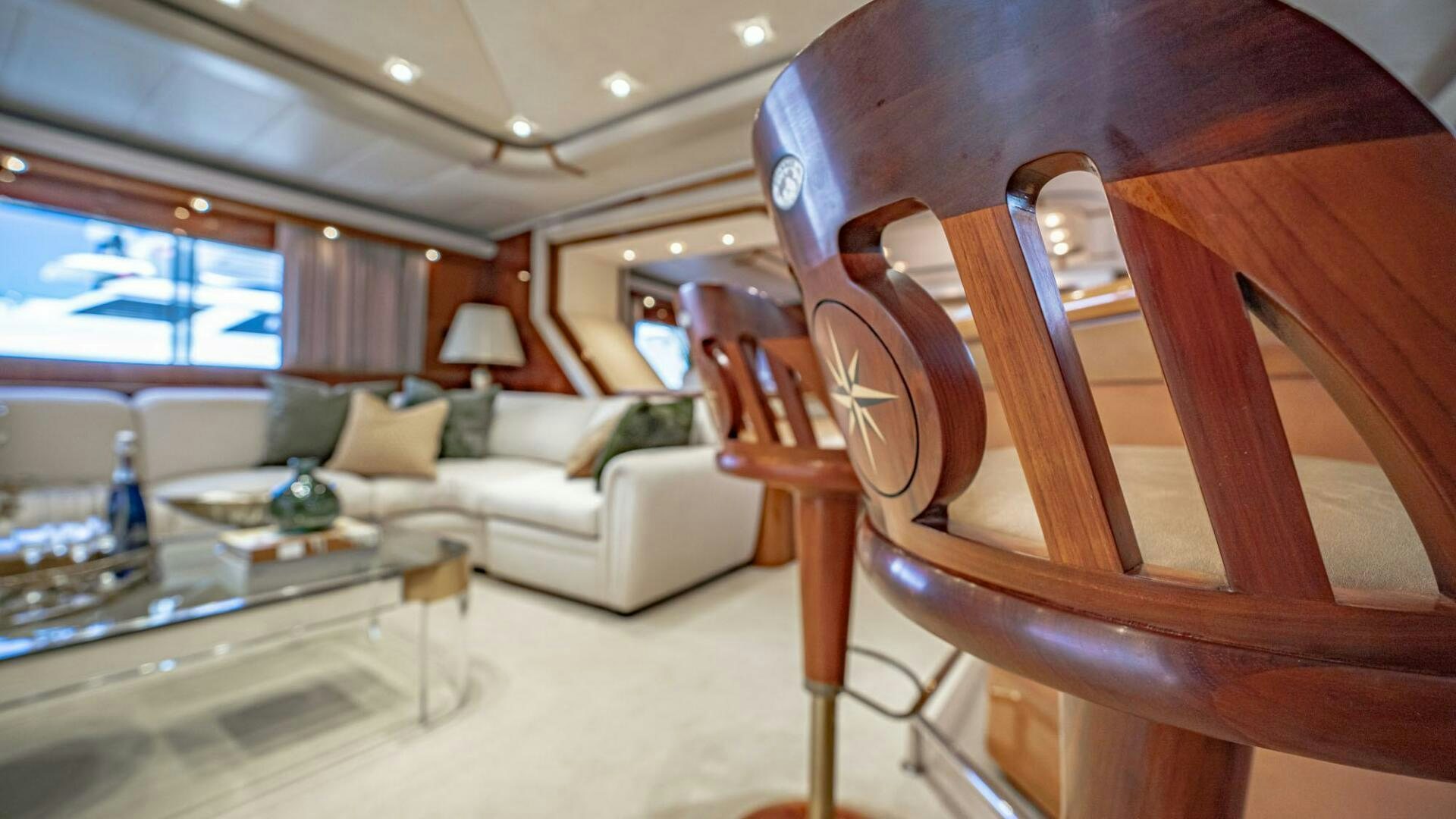 a room with a couch and a chair aboard SHALIMAR Yacht for Sale