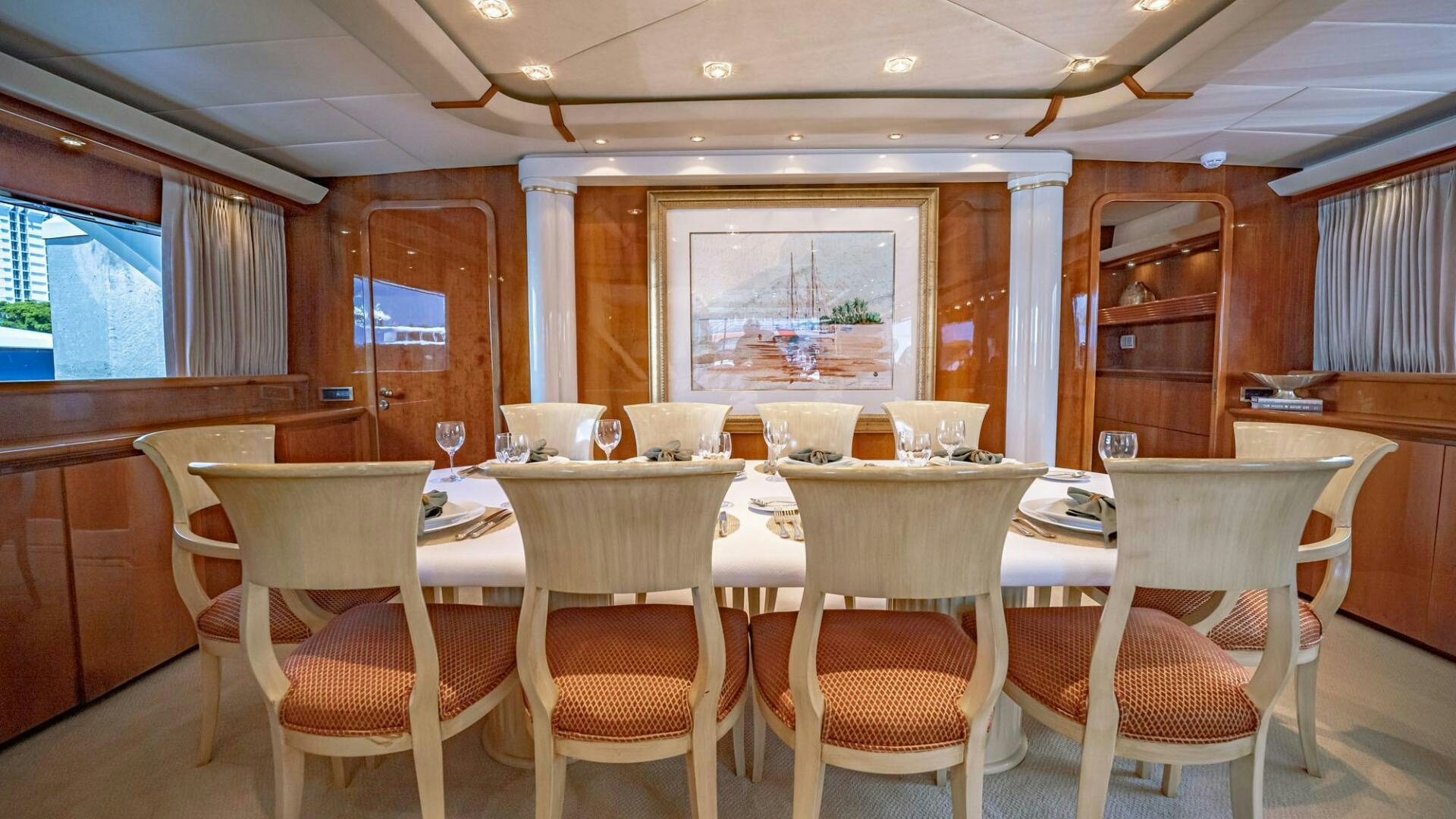 a large dining room with tables and chairs aboard SHALIMAR Yacht for Sale
