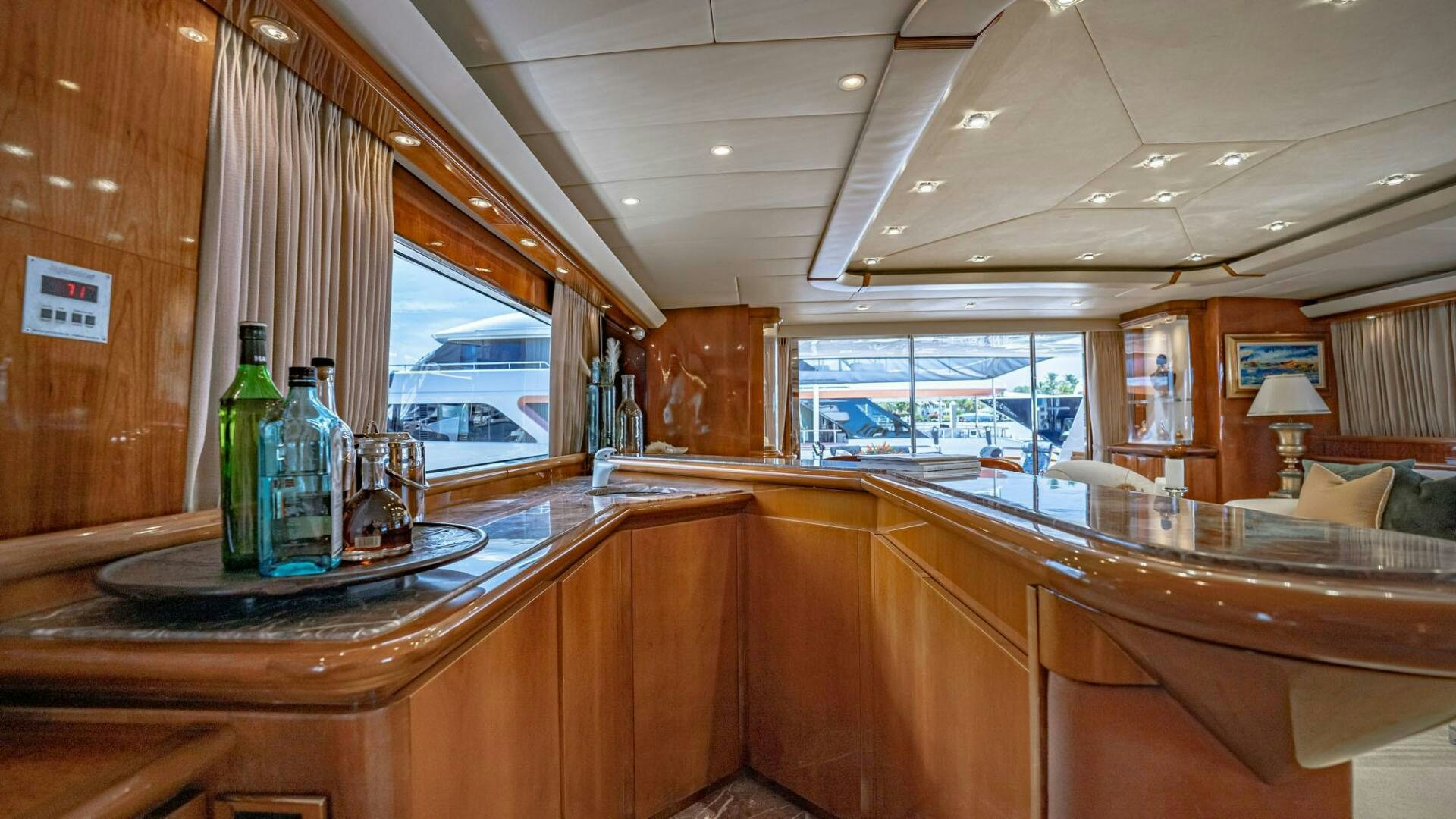 a room with a table and chairs aboard SHALIMAR Yacht for Sale