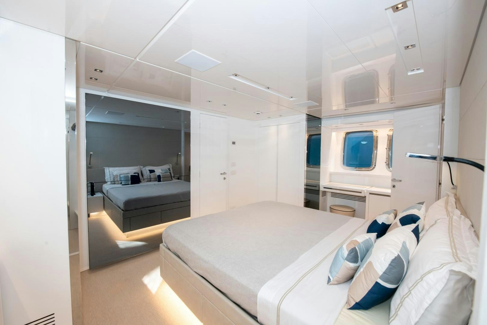 a room with a bed and a television aboard MARAVI Yacht for Sale