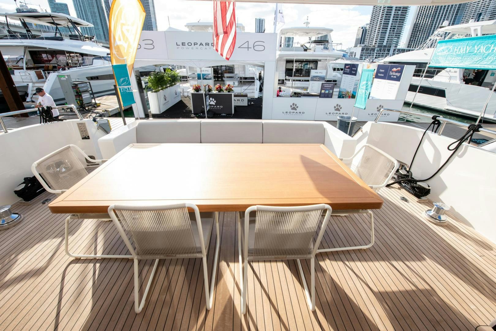 a table with chairs around it aboard MARAVI Yacht for Sale