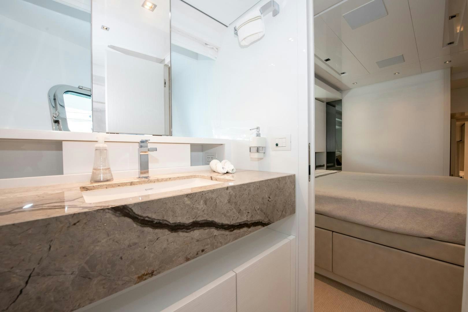 a bathroom with a countertop sink aboard MARAVI Yacht for Sale