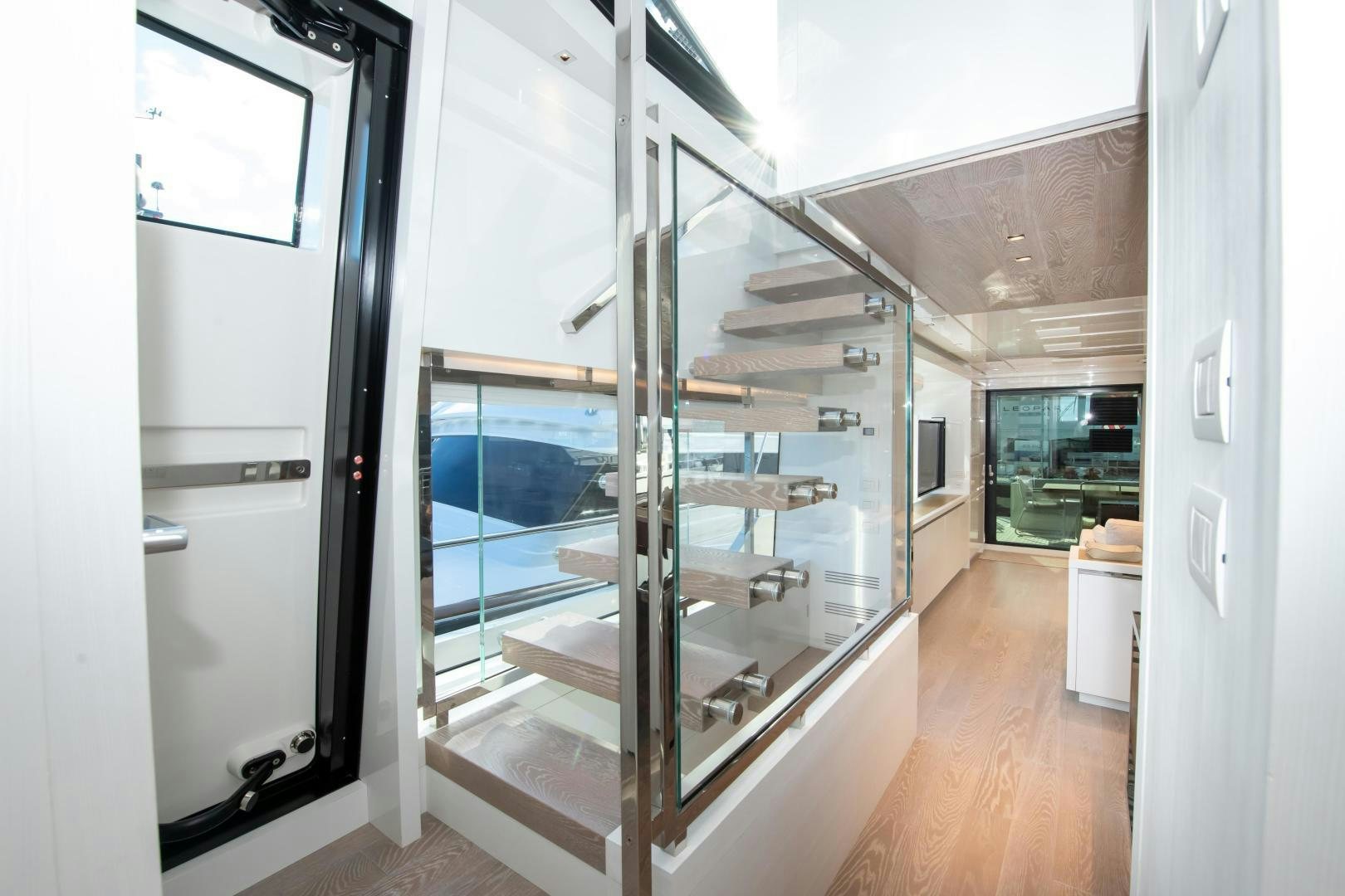 a room with a glass door aboard MARAVI Yacht for Sale