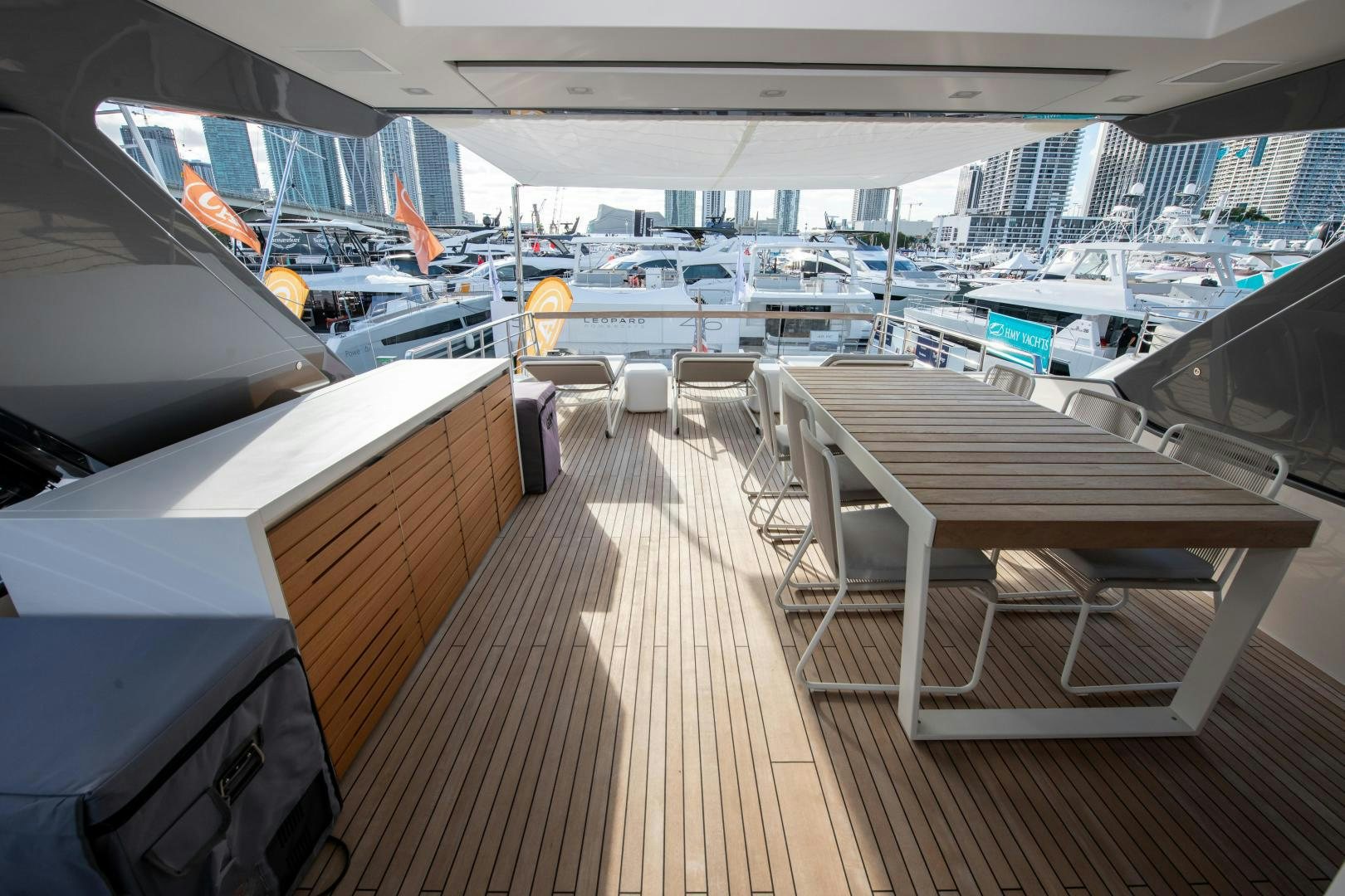 a large room with many chairs and tables aboard MARAVI Yacht for Sale