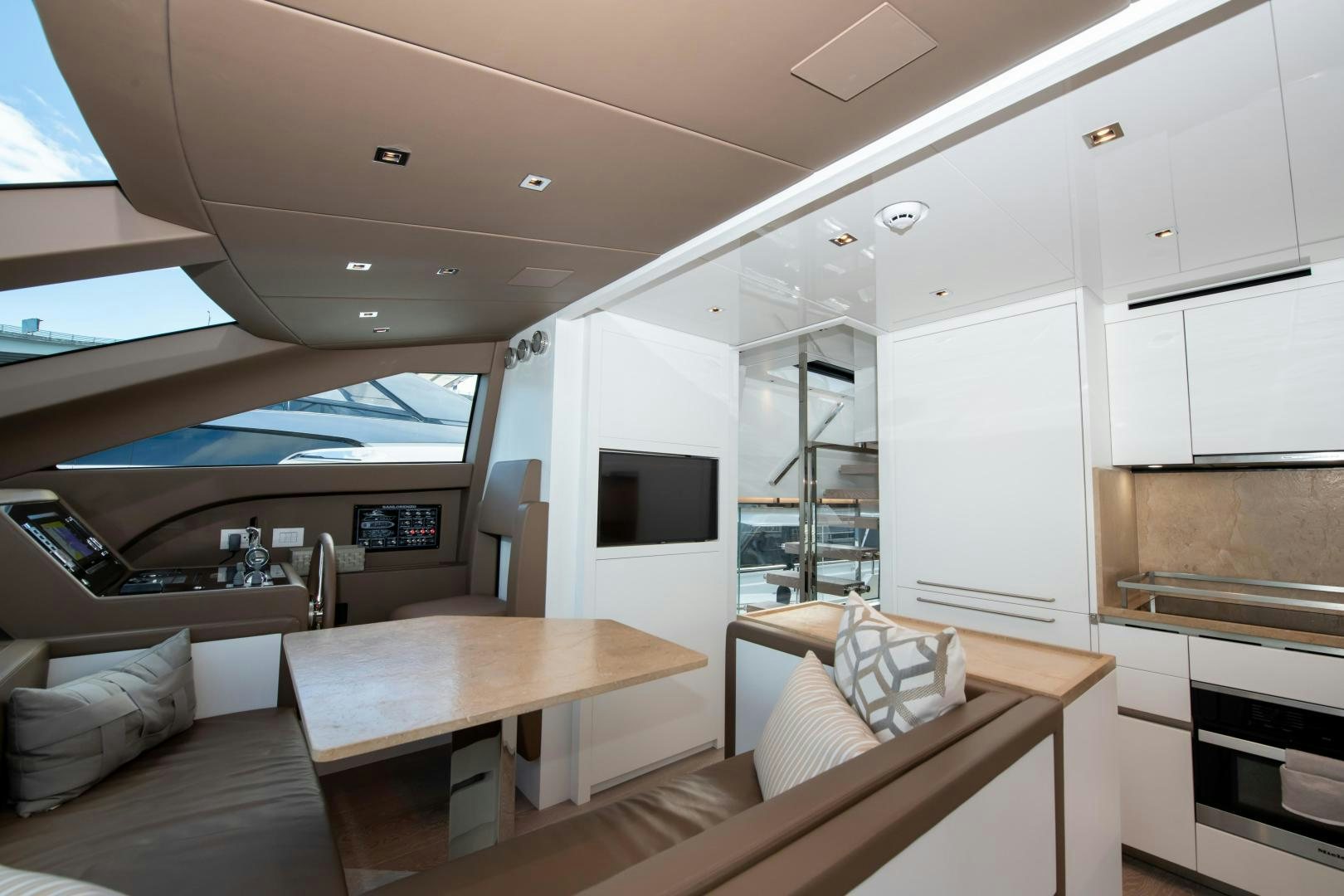 a room with a bed and a table aboard MARAVI Yacht for Sale