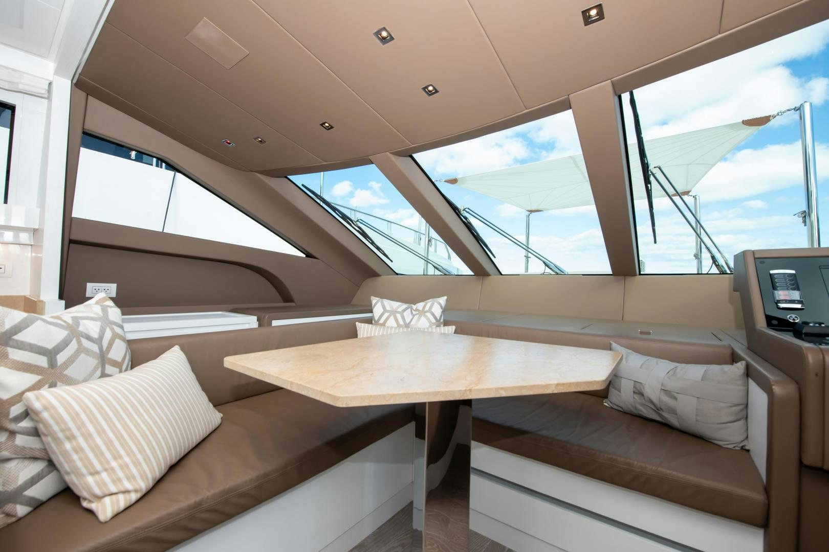 a room with a bed and a table aboard MARAVI Yacht for Sale