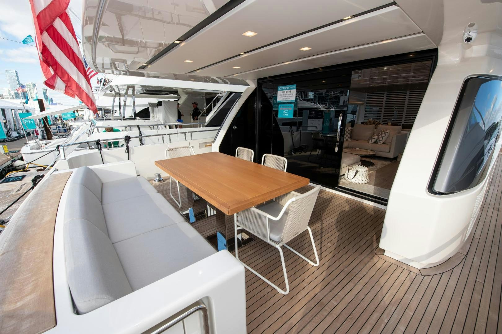 a room with tables and chairs aboard MARAVI Yacht for Sale