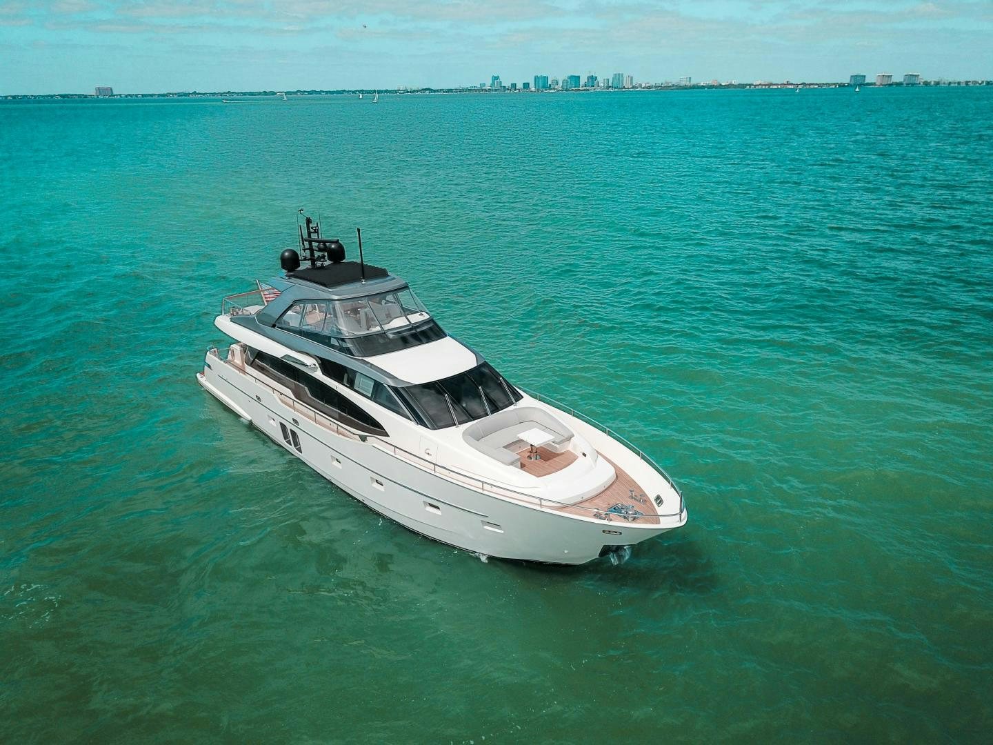 a white boat in the water aboard MARAVI Yacht for Sale