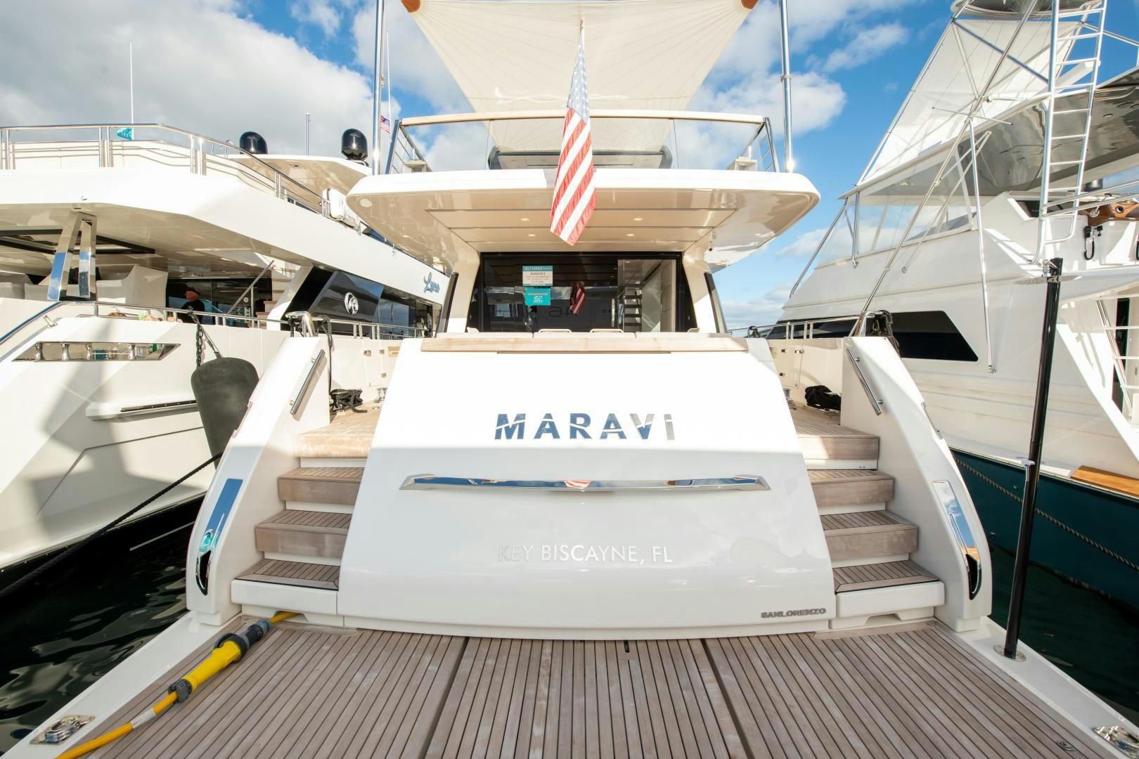 a row of white yachts aboard MARAVI Yacht for Sale