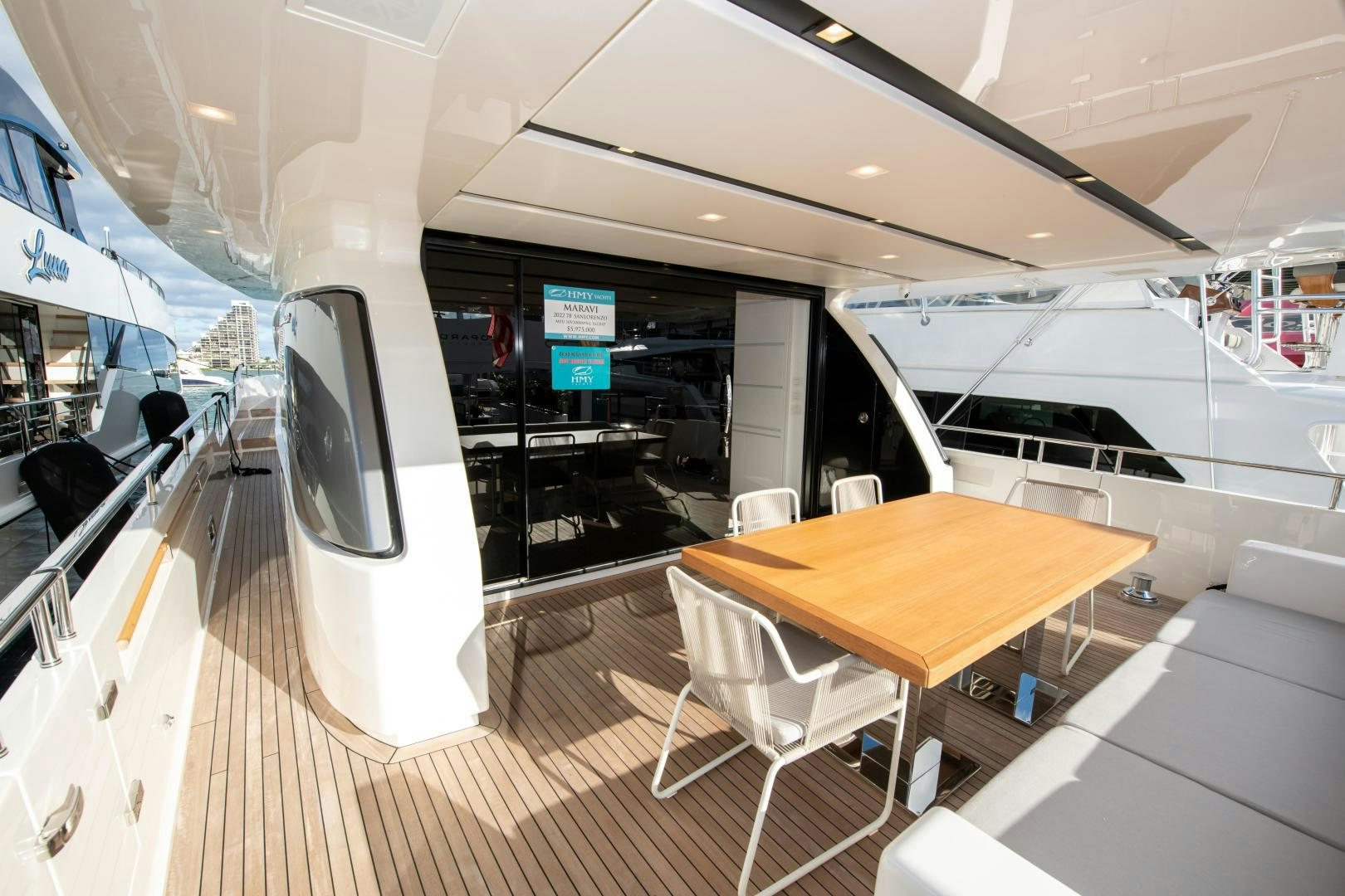 a room with a table and chairs aboard MARAVI Yacht for Sale