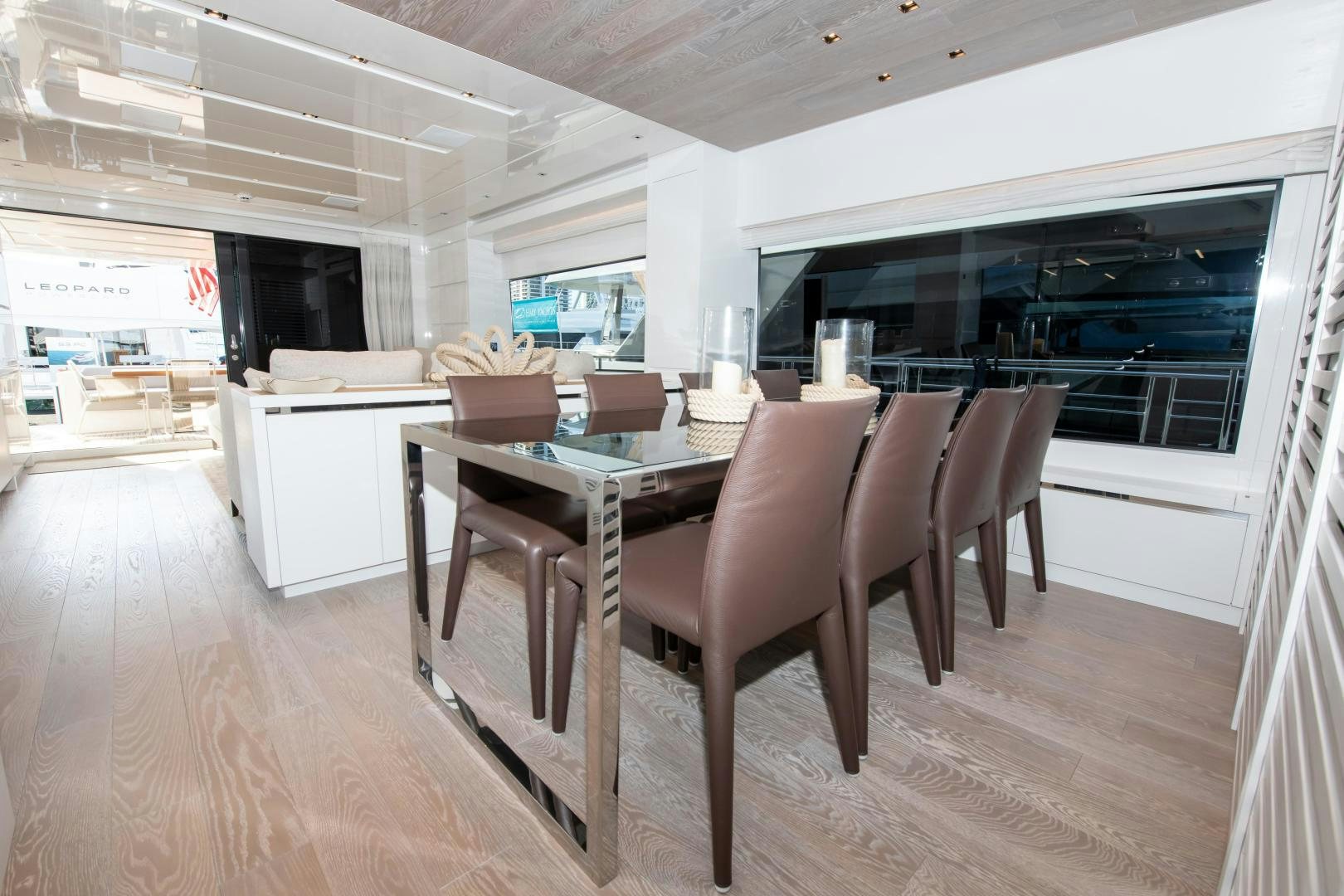 a dining room with a table and chairs aboard MARAVI Yacht for Sale