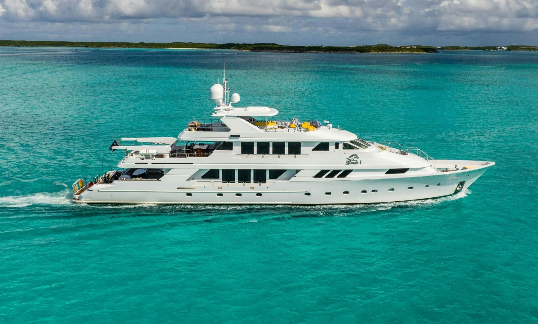 a white yacht in the water aboard GRADE I Yacht for Sale
