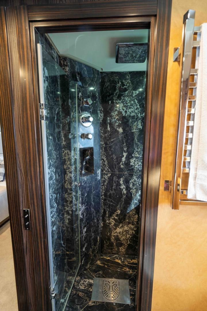 a door with a glass door aboard ENCORE Yacht for Sale