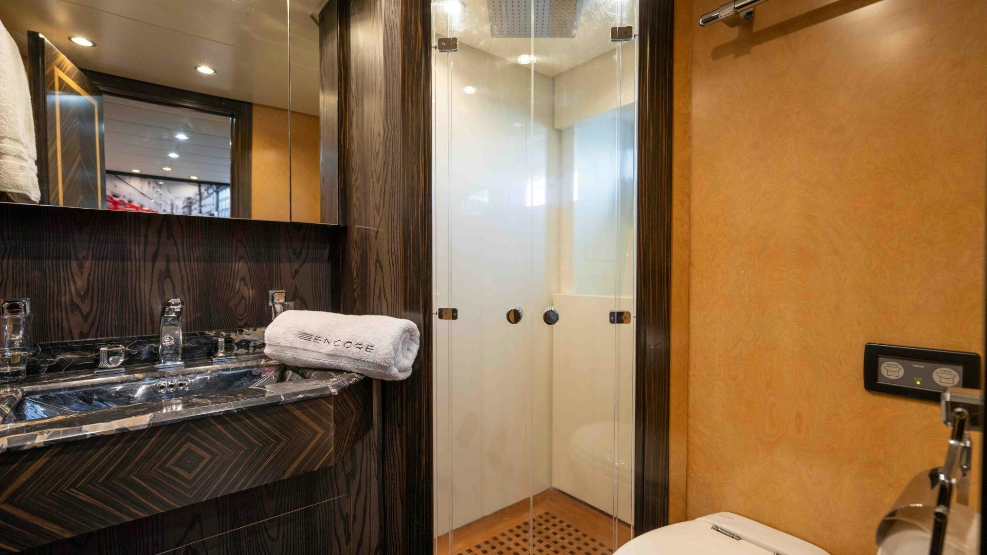 a bathroom with a sink and a mirror aboard ENCORE Yacht for Sale
