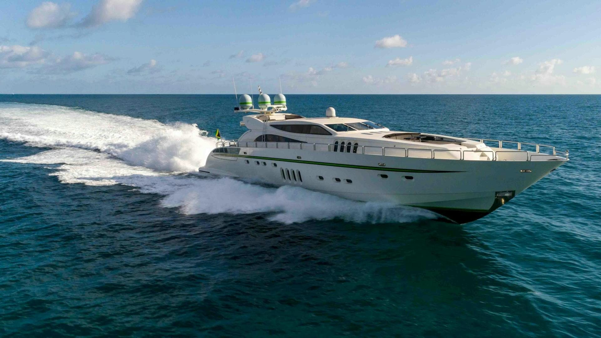 a white boat on the water aboard ENCORE Yacht for Sale