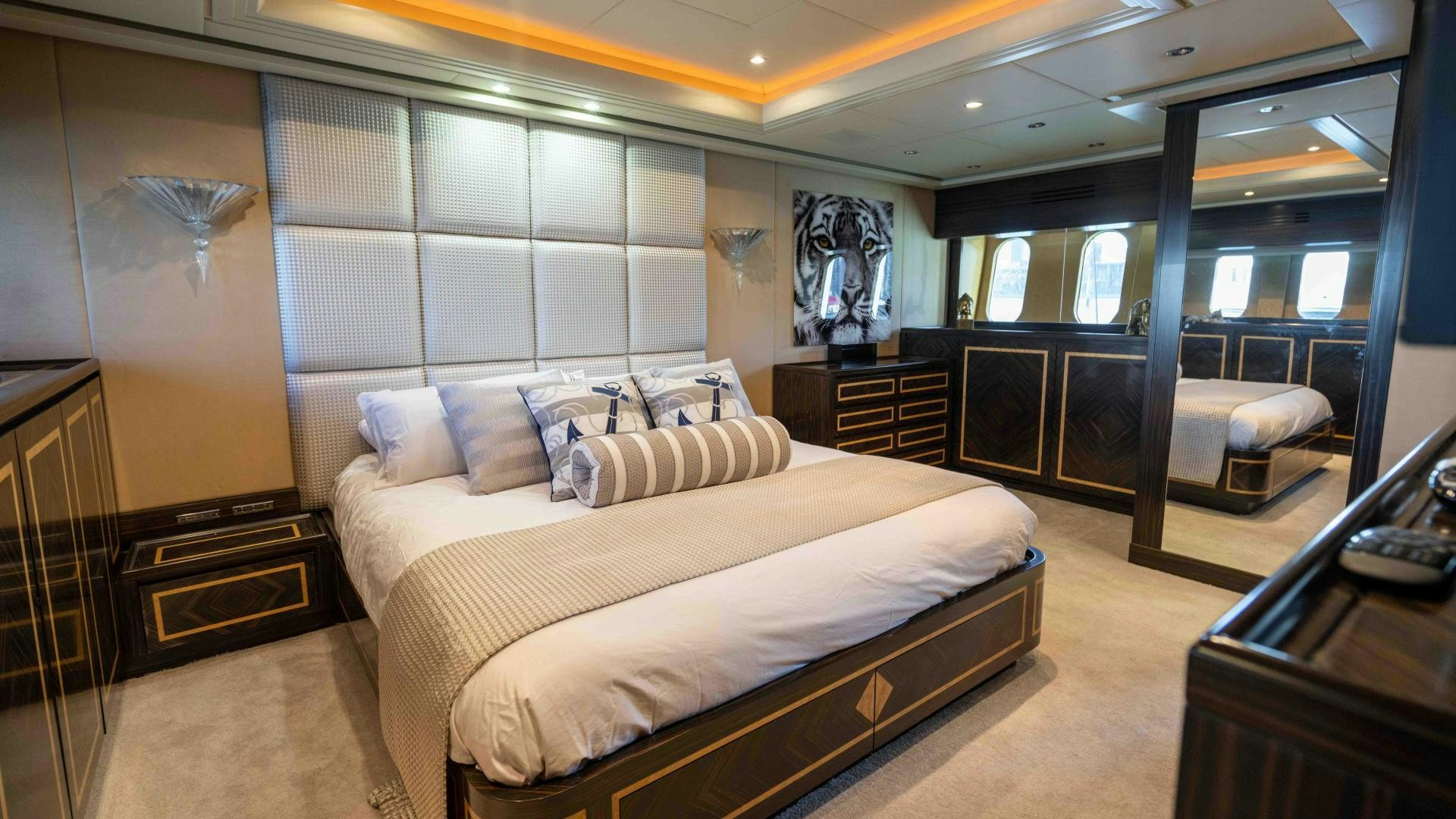 a large bedroom with a large bed aboard ENCORE Yacht for Sale