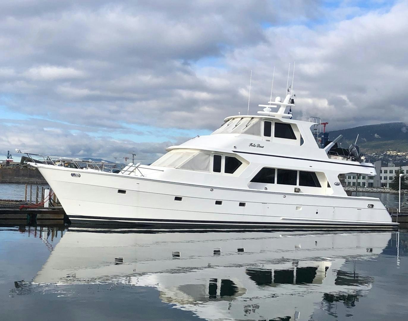 a white yacht in the water aboard FOLIE DEUX Yacht for Sale