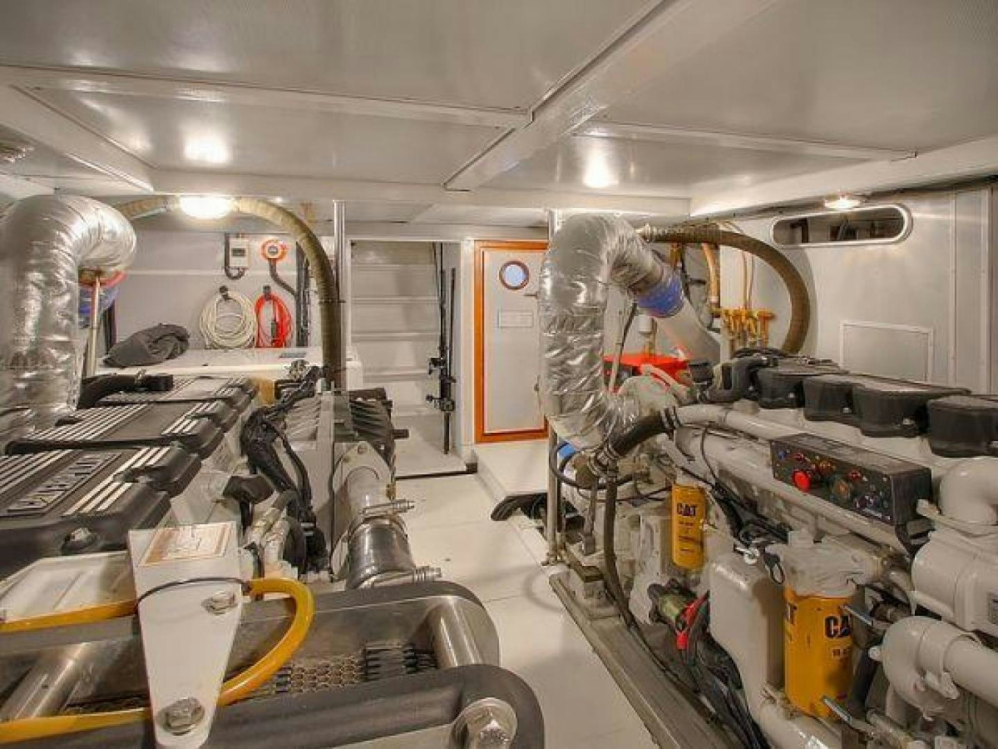 a person working in a factory aboard FOLIE DEUX Yacht for Sale