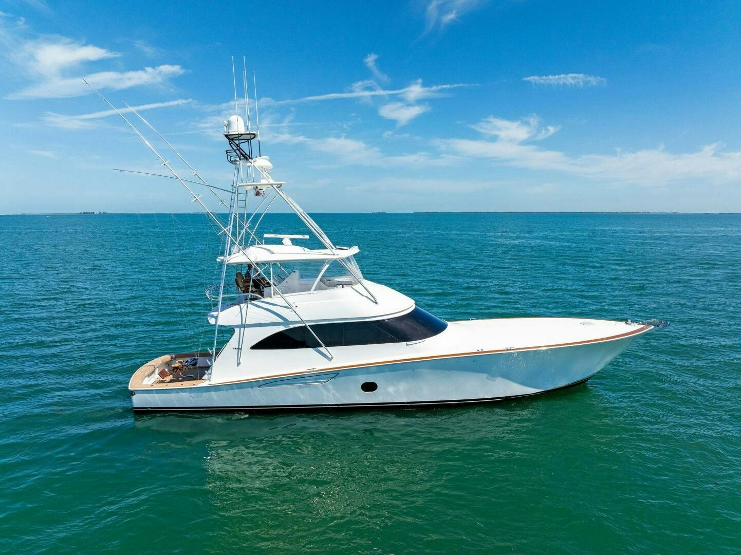 a white boat in the water aboard THE PROVIDER Yacht for Sale