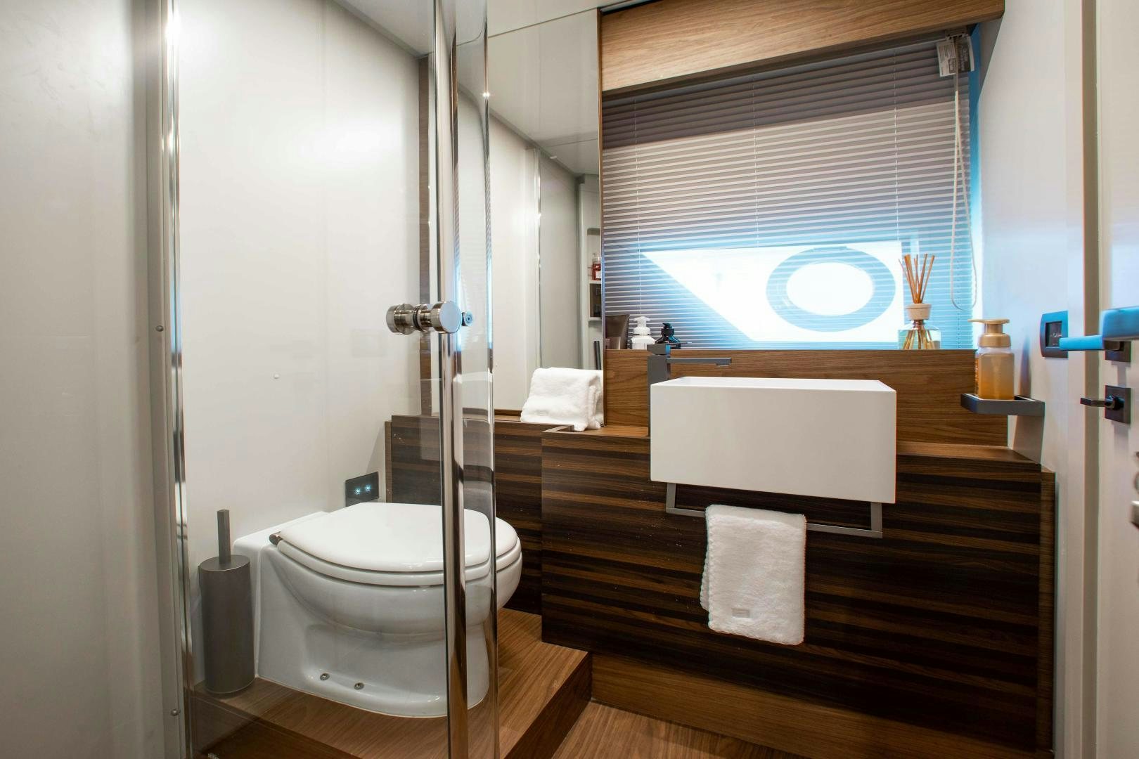 a bathroom with a large window aboard OUR TRADE Yacht for Sale