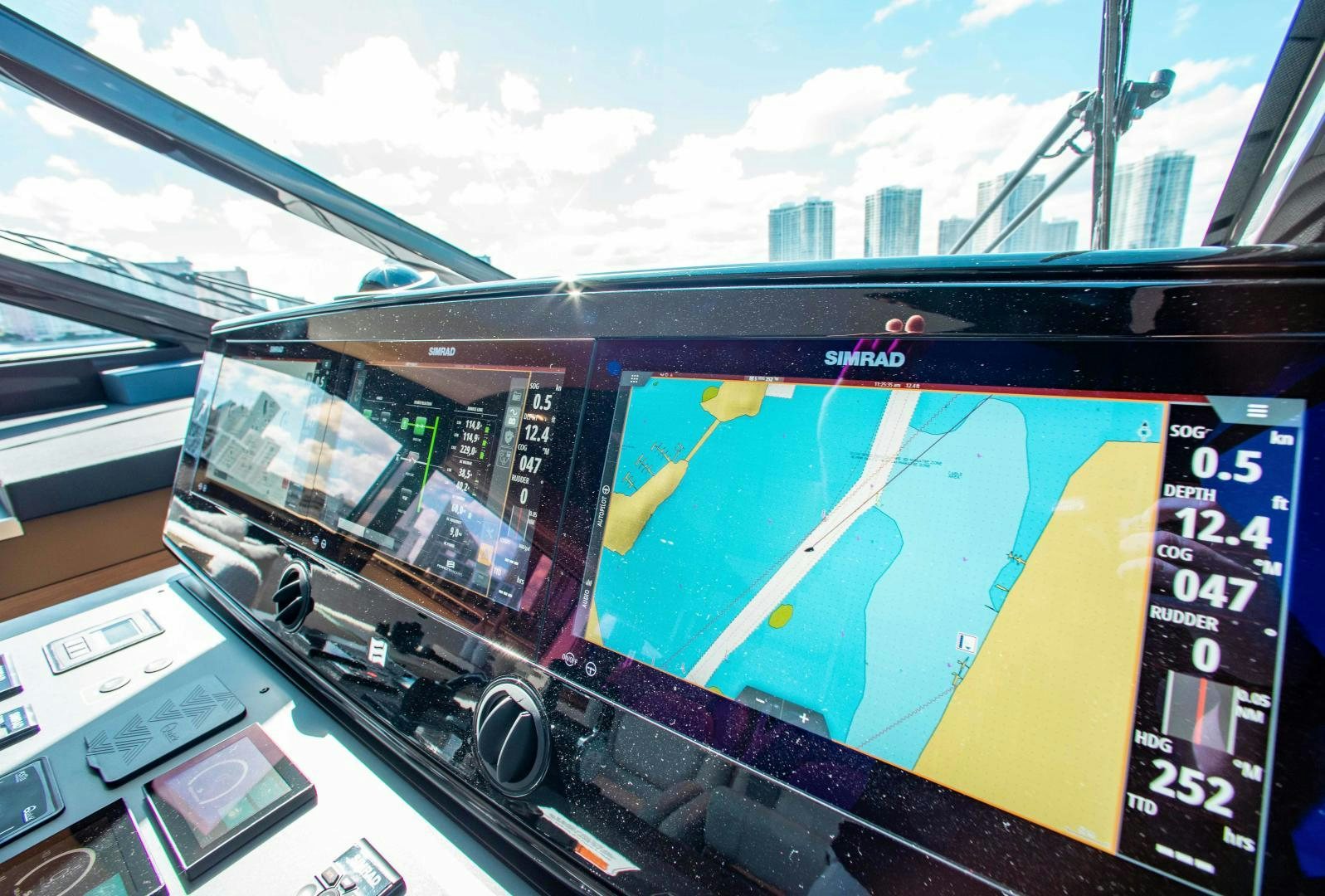 a screen on a vehicle aboard OUR TRADE Yacht for Sale