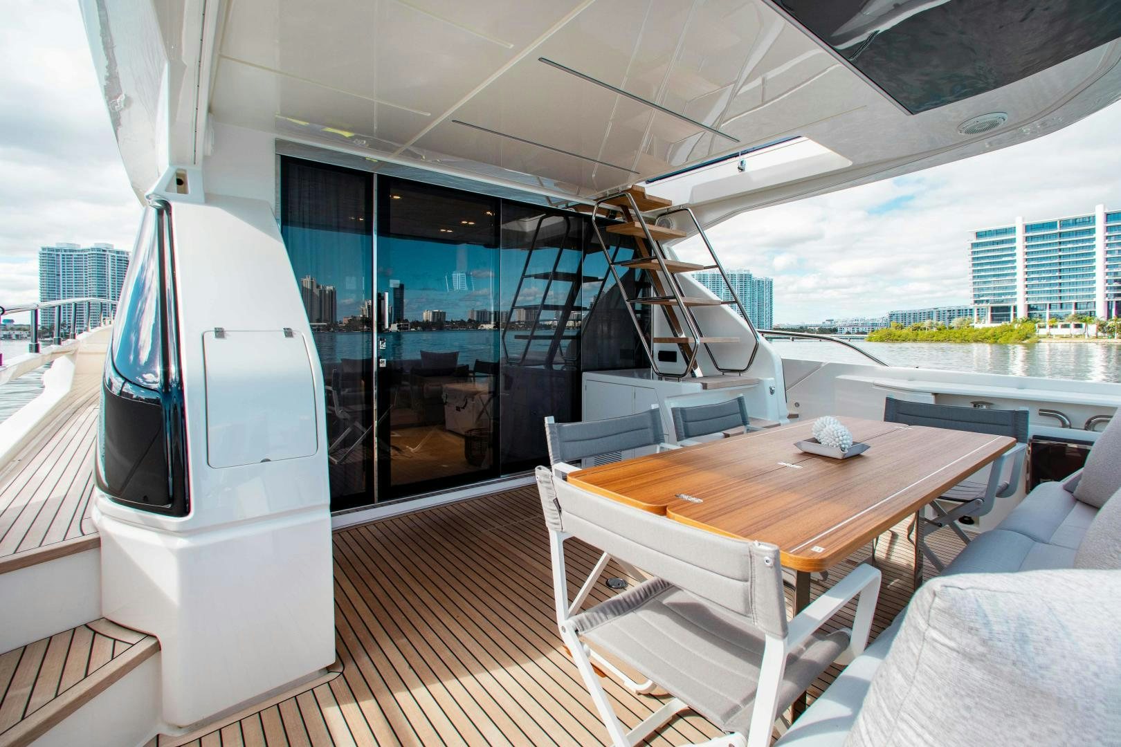 a room with a table and chairs aboard OUR TRADE Yacht for Sale