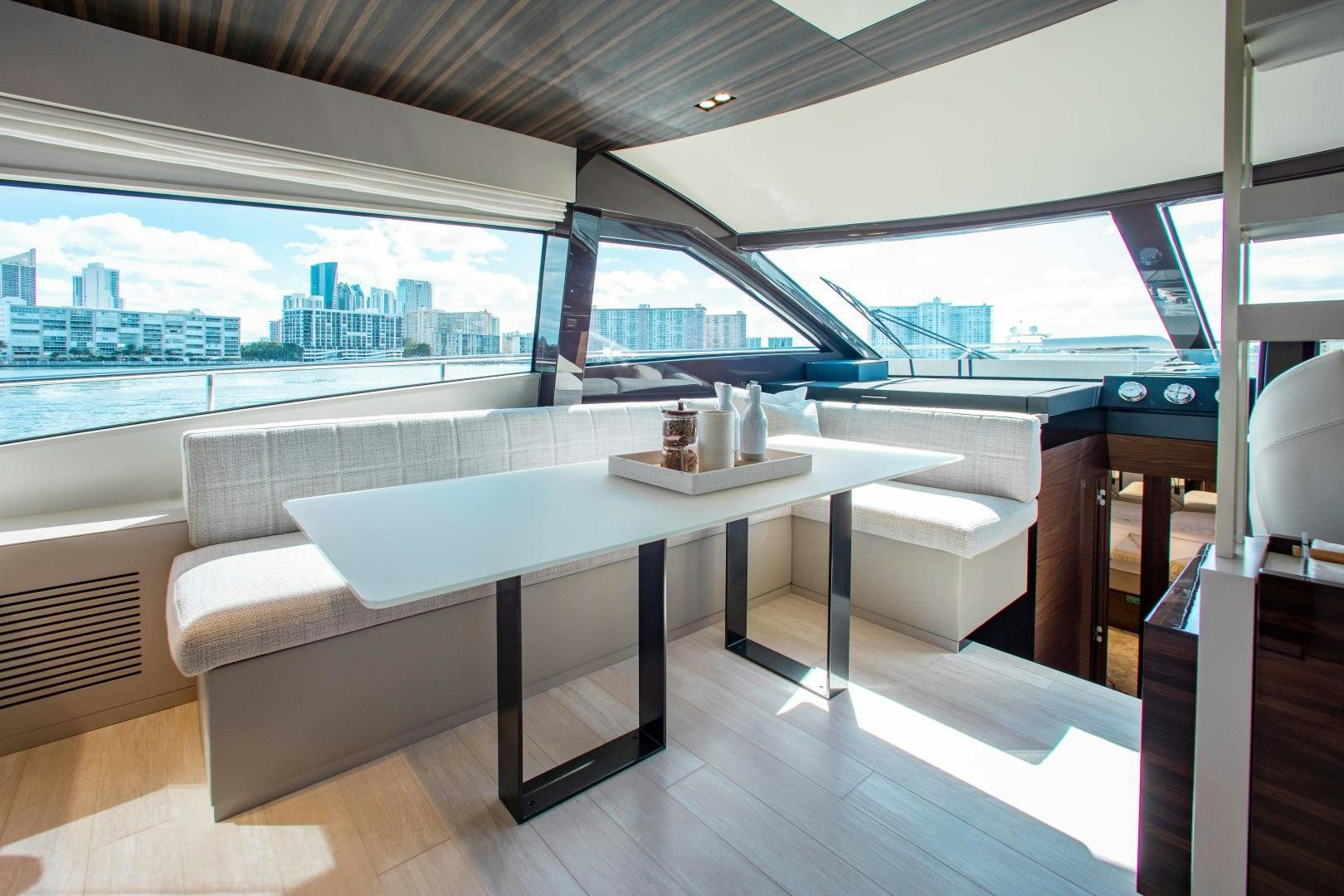 a room with a table and chairs aboard OUR TRADE Yacht for Sale
