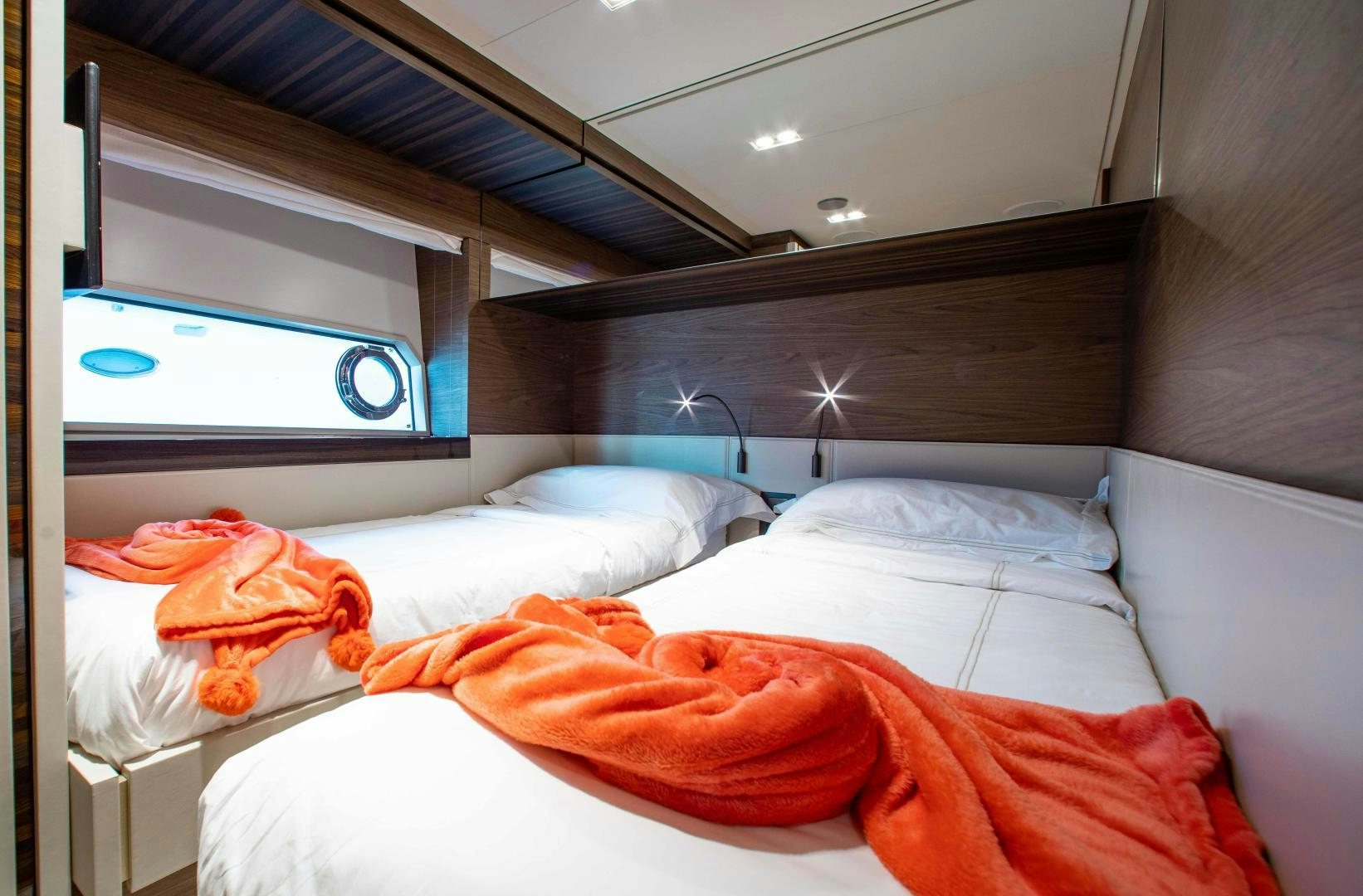 a room with beds and a window aboard OUR TRADE Yacht for Sale