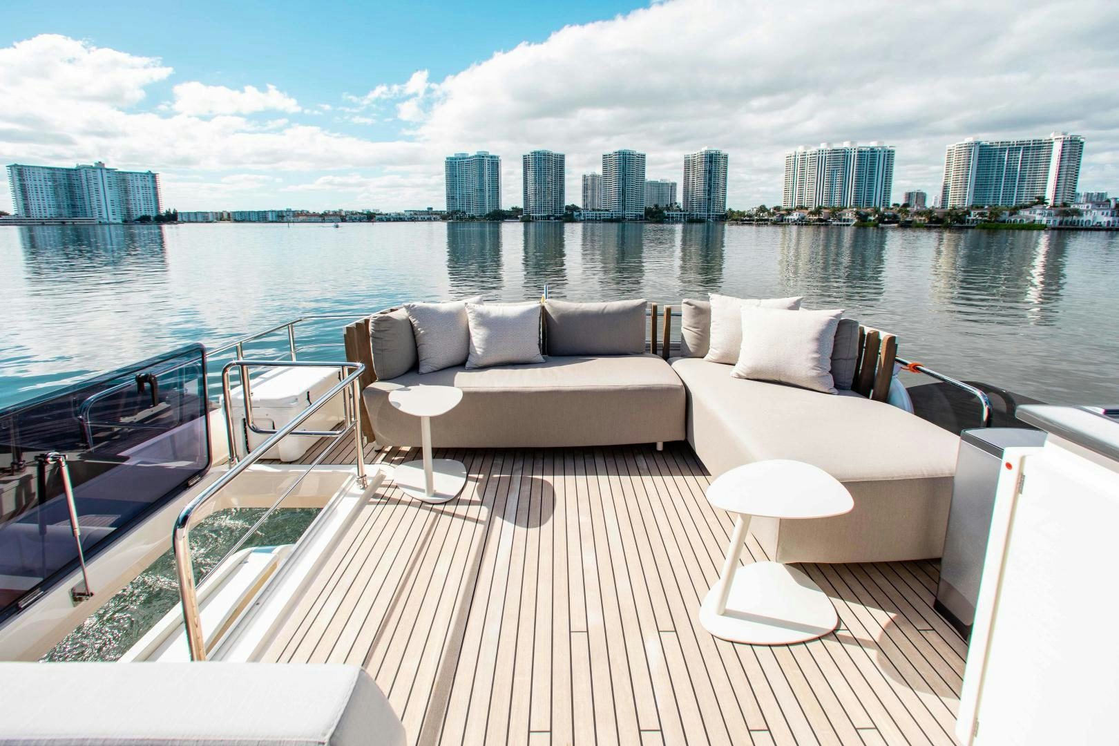 a deck with a view of a city and water aboard OUR TRADE Yacht for Sale