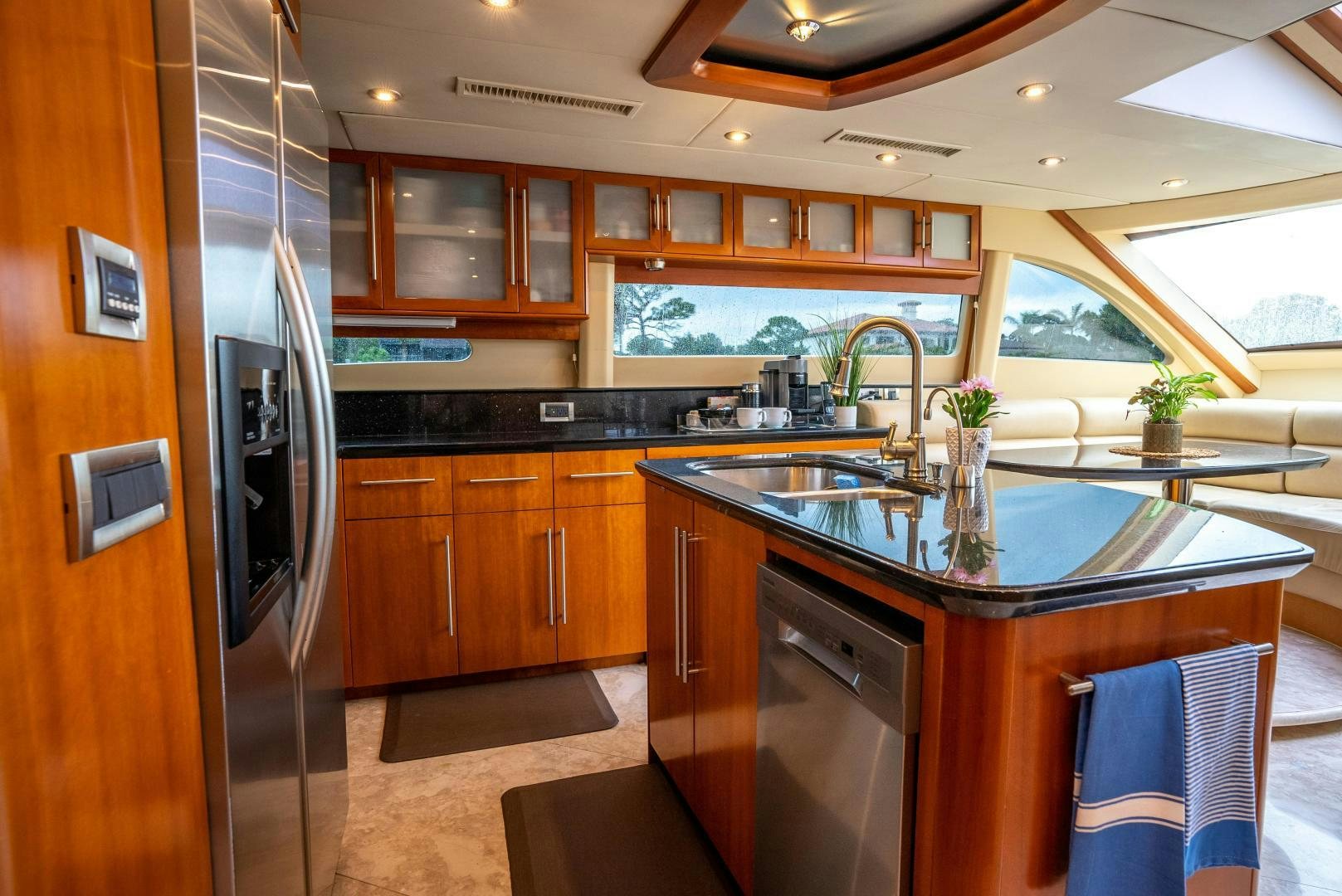 a kitchen with a large island aboard STARFIRE Yacht for Sale