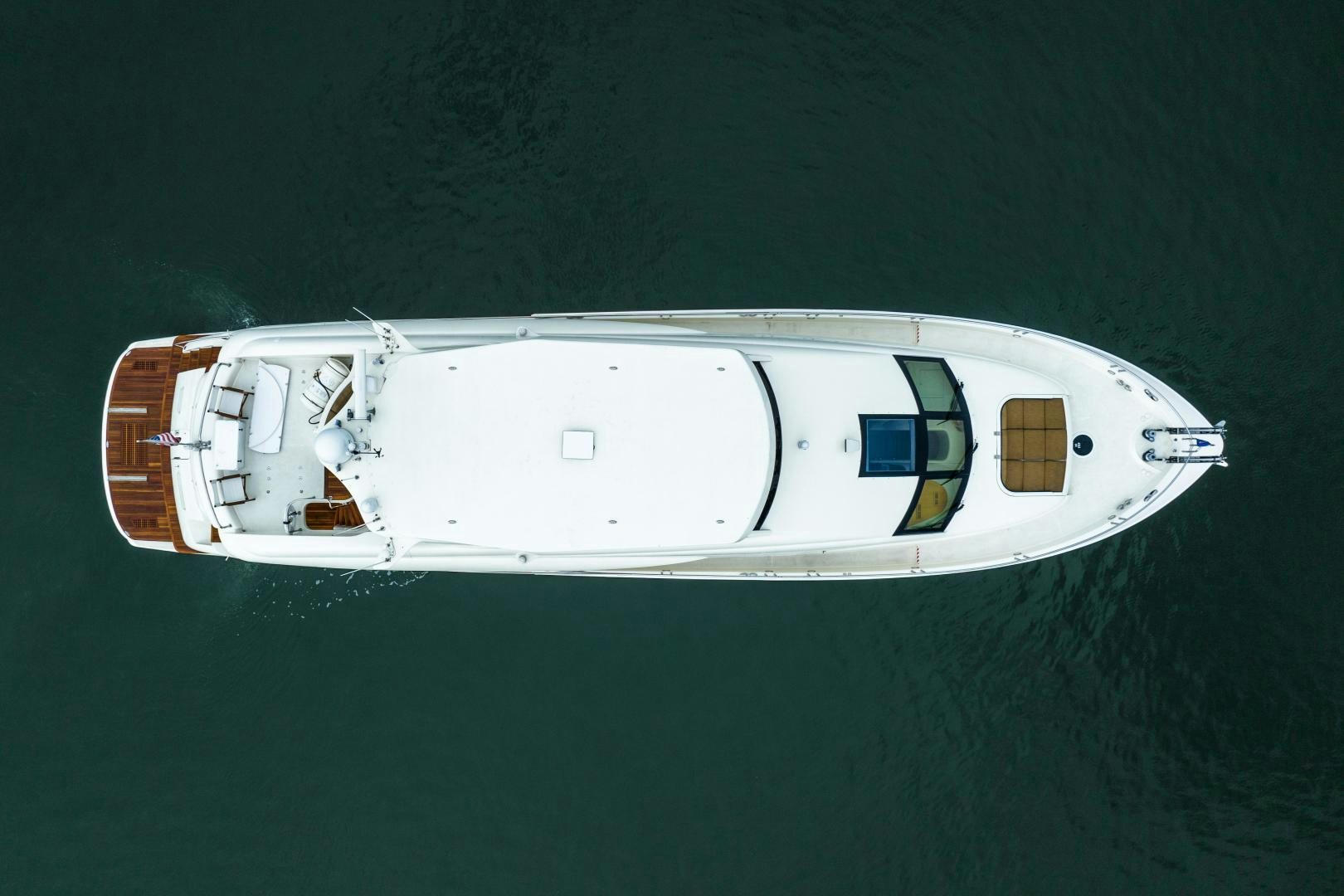 a white boat in the water aboard STARFIRE Yacht for Sale