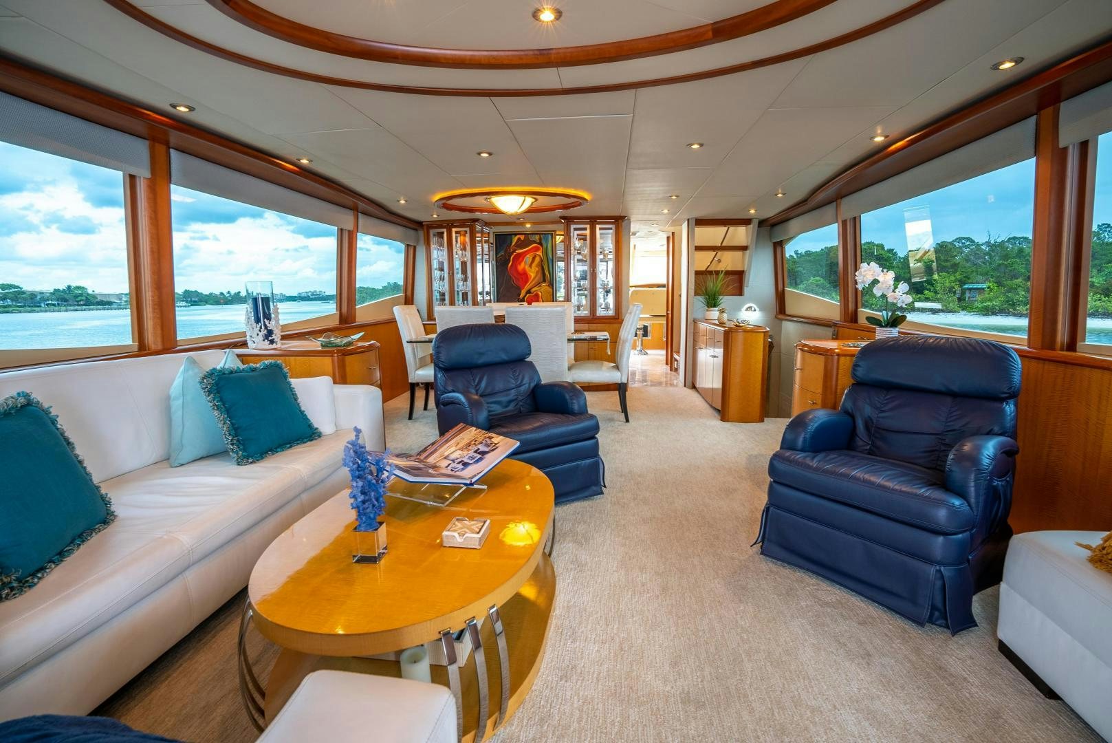 a living room with a large window aboard STARFIRE Yacht for Sale