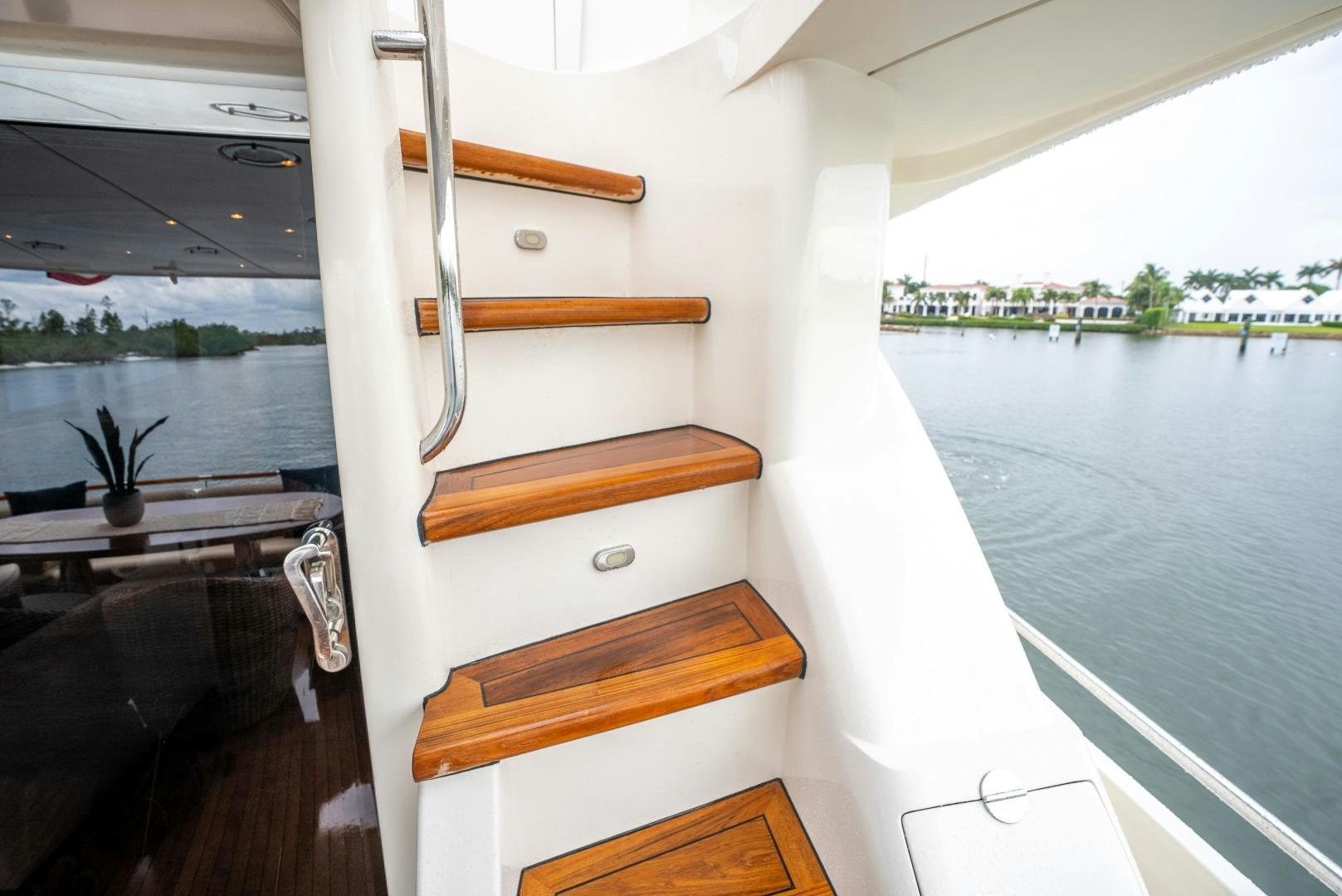 a wooden boat on a body of water aboard STARFIRE Yacht for Sale