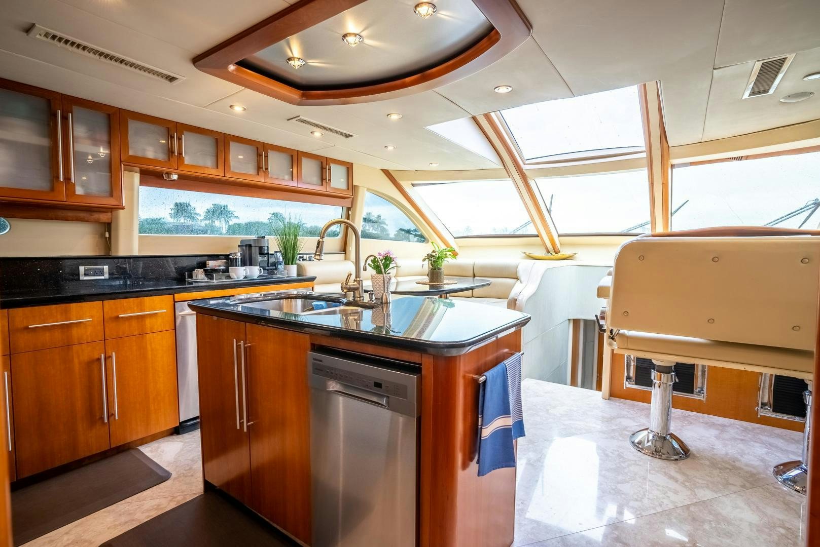 a kitchen with a large island aboard STARFIRE Yacht for Sale