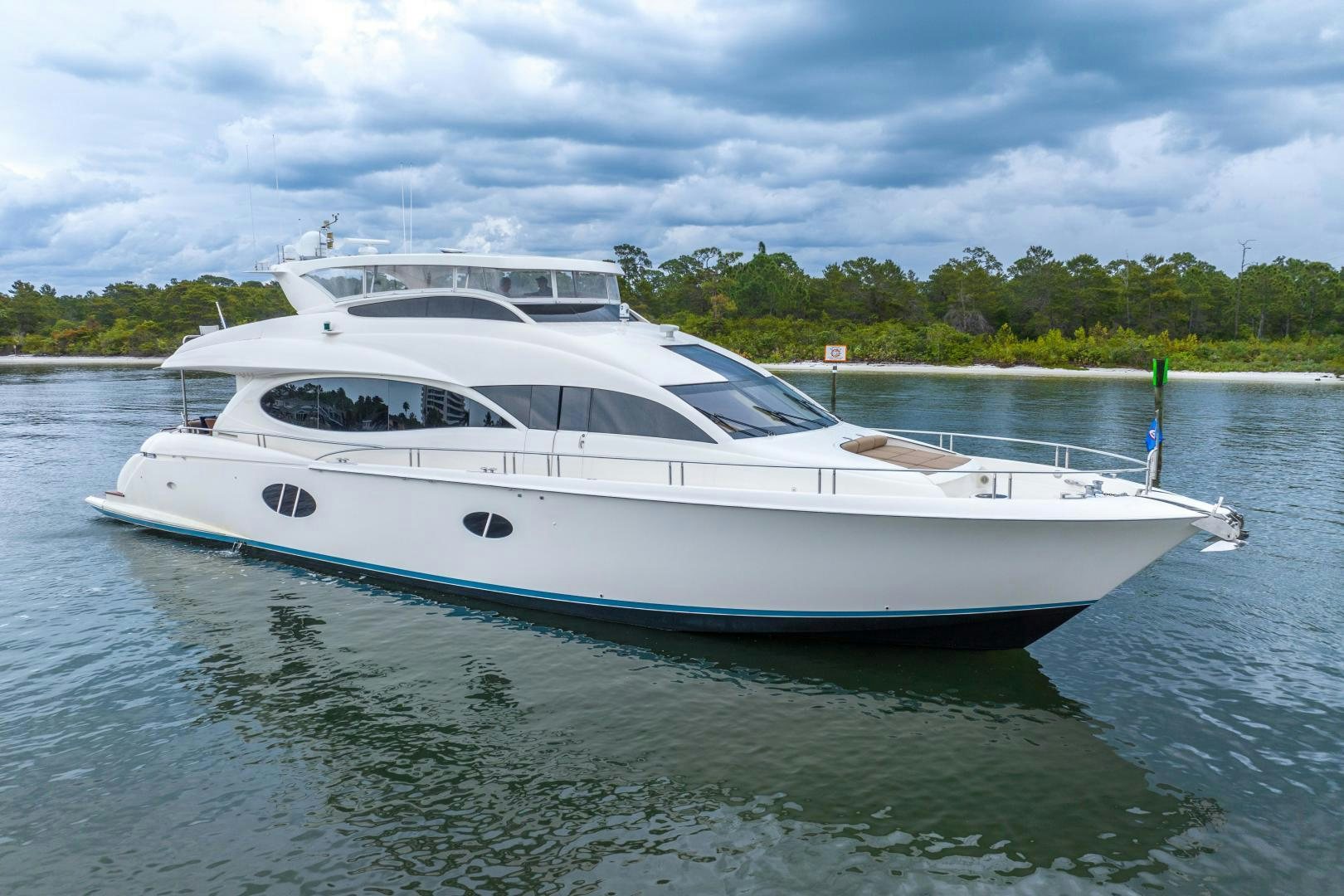 a white boat in the water aboard STARFIRE Yacht for Sale