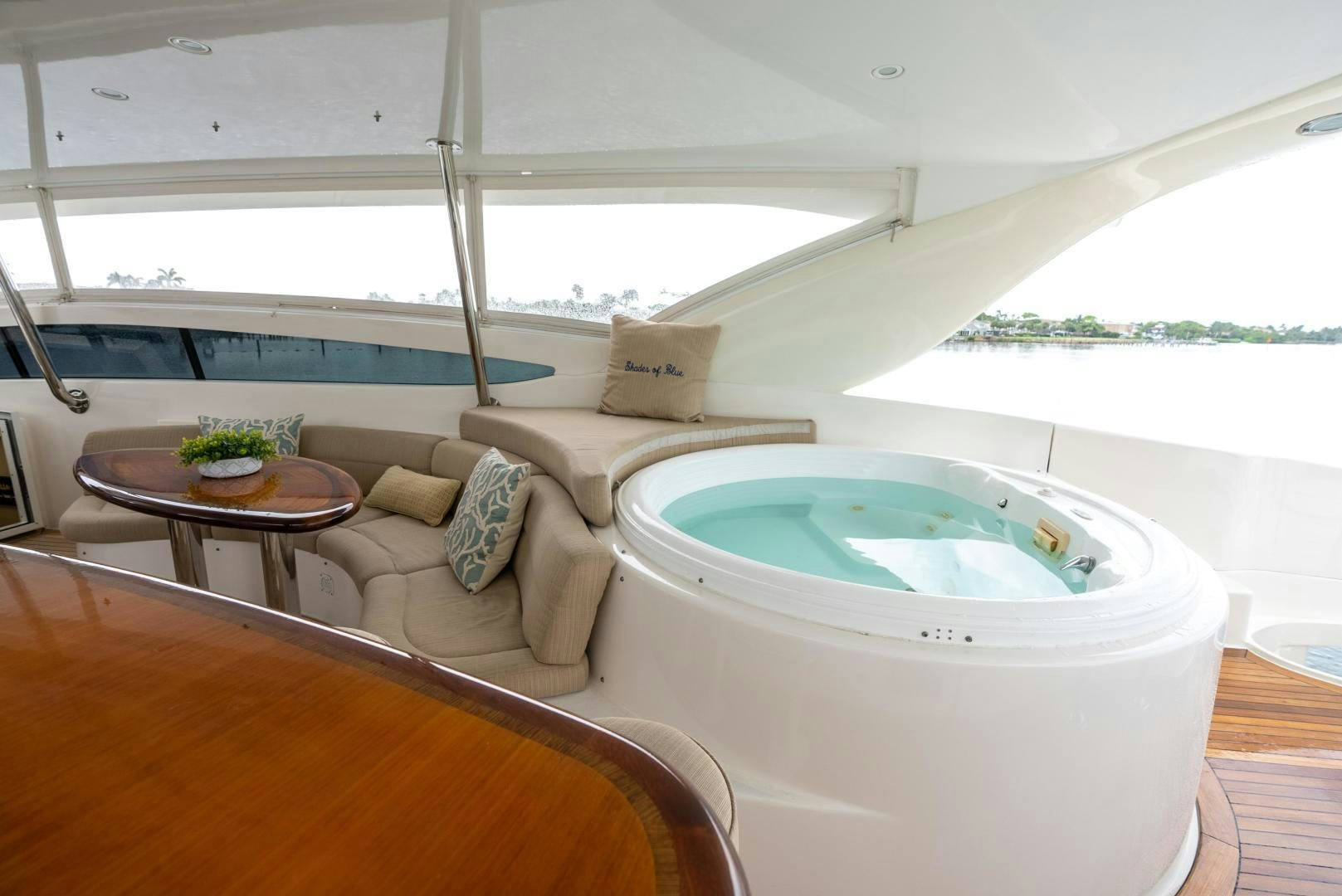a living room with a couch and a table aboard STARFIRE Yacht for Sale