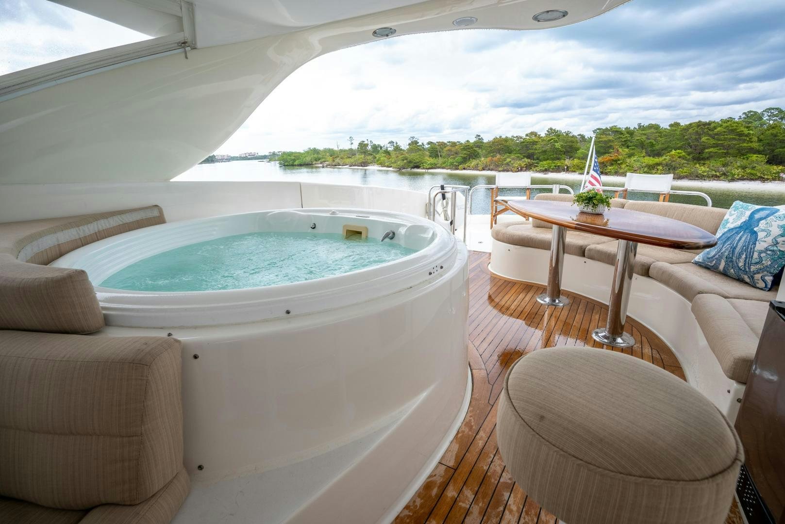 a room with a table and chairs aboard STARFIRE Yacht for Sale