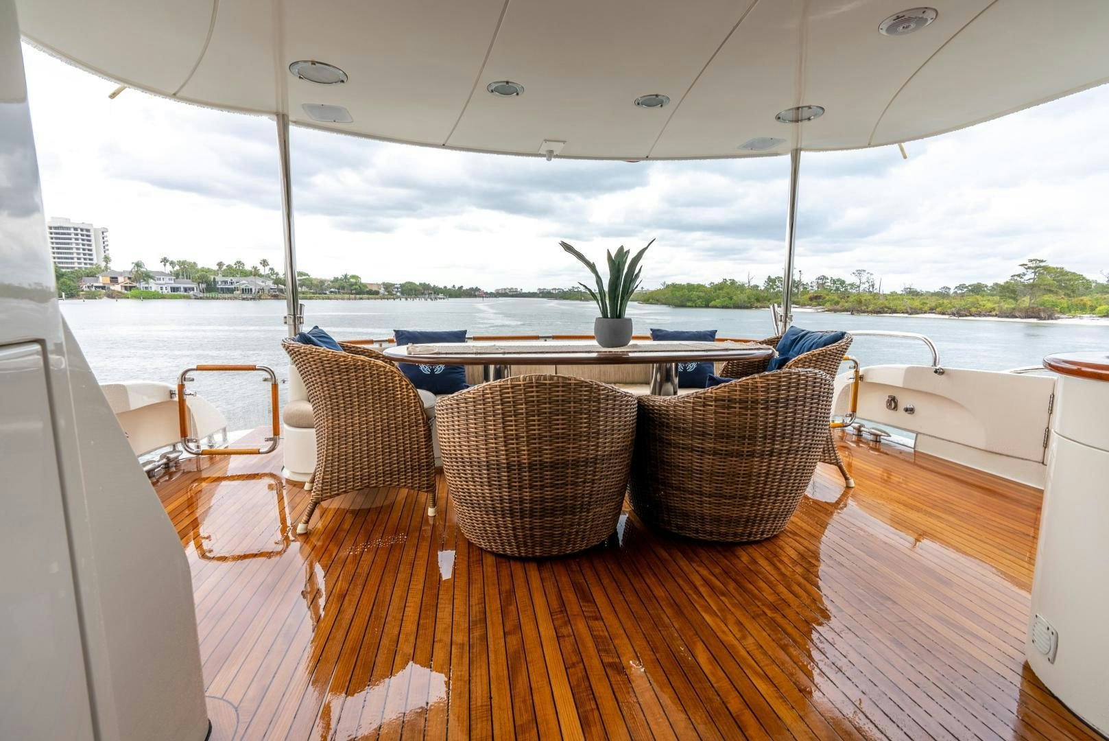 a table with chairs on it aboard STARFIRE Yacht for Sale