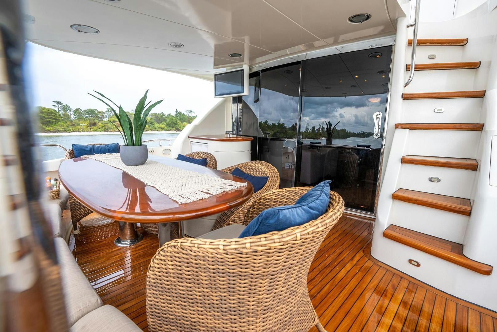 a room with a table and chairs aboard STARFIRE Yacht for Sale