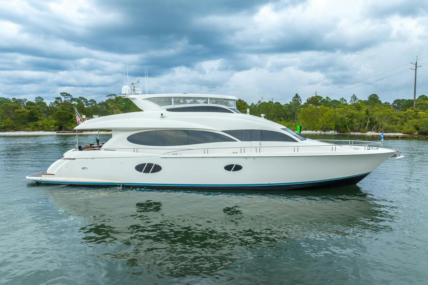 a white boat in the water aboard STARFIRE Yacht for Sale