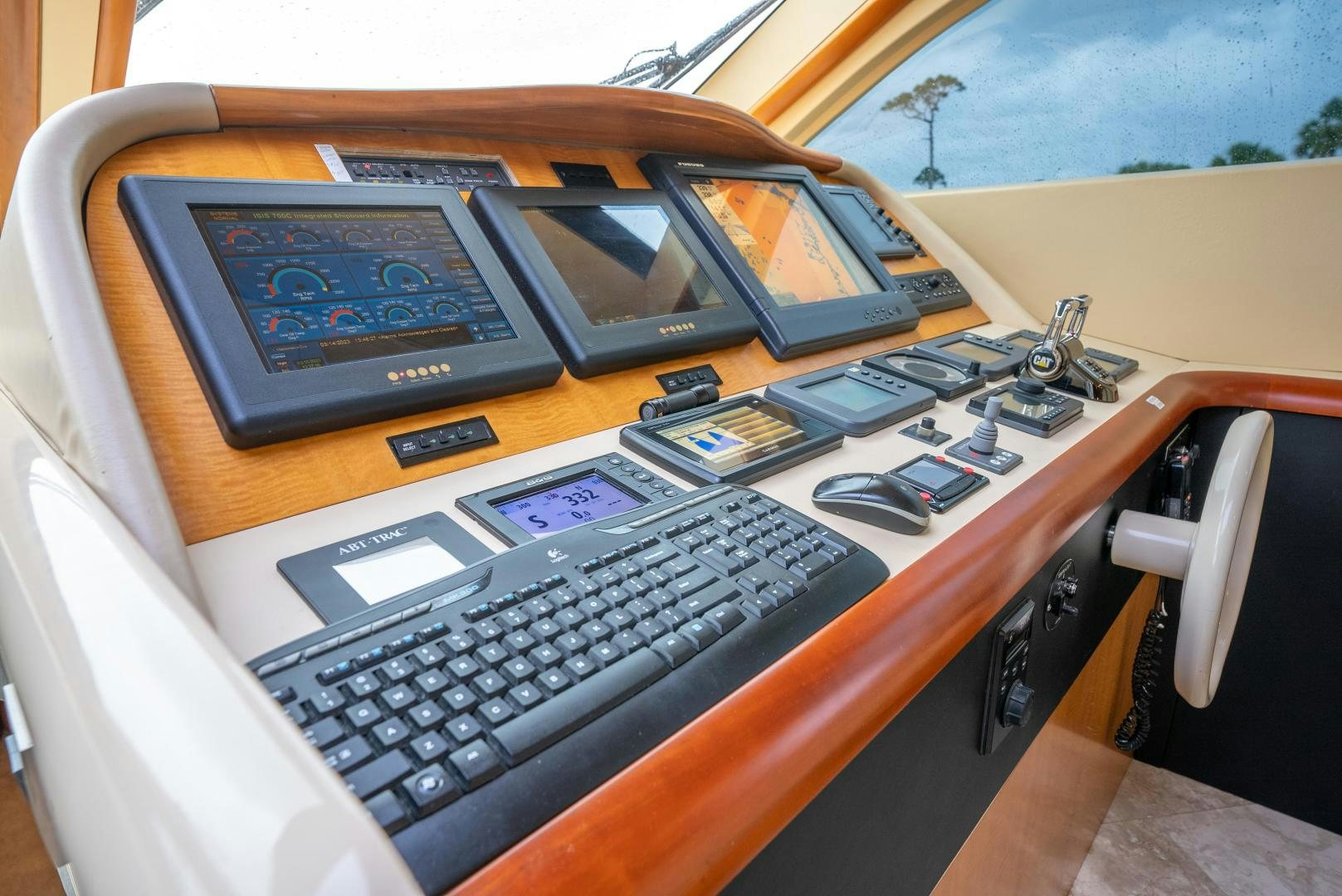 a laptop computer on a table aboard STARFIRE Yacht for Sale