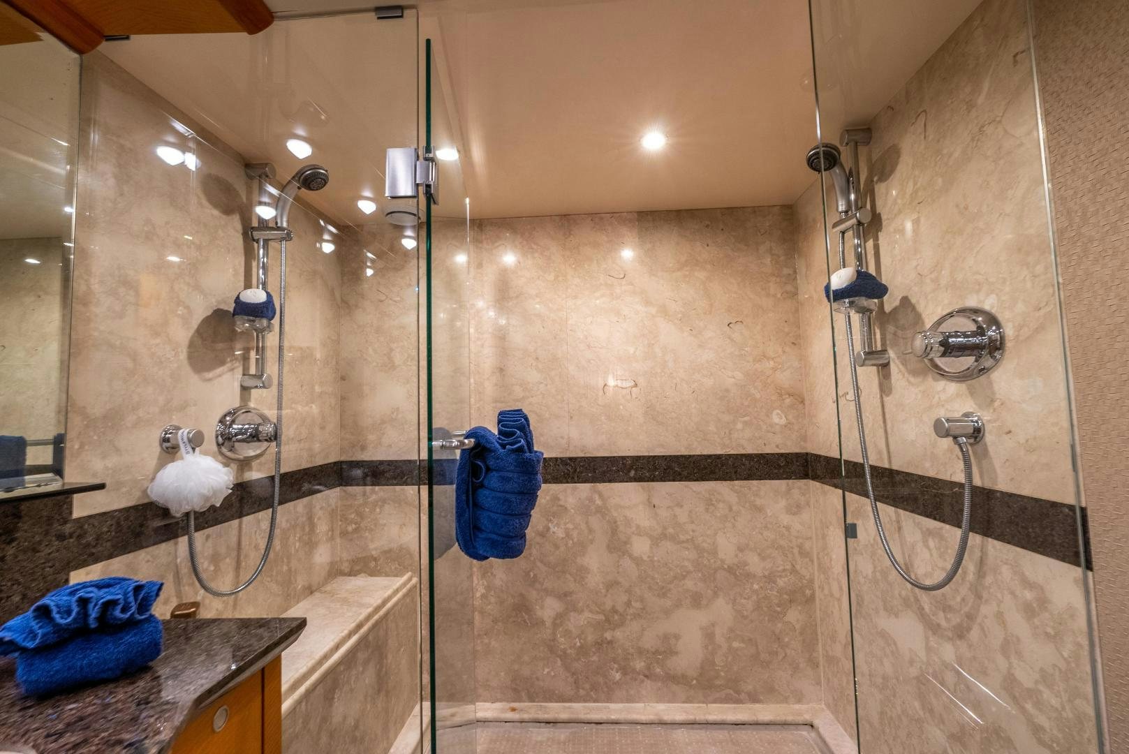 a shower with a glass door aboard STARFIRE Yacht for Sale