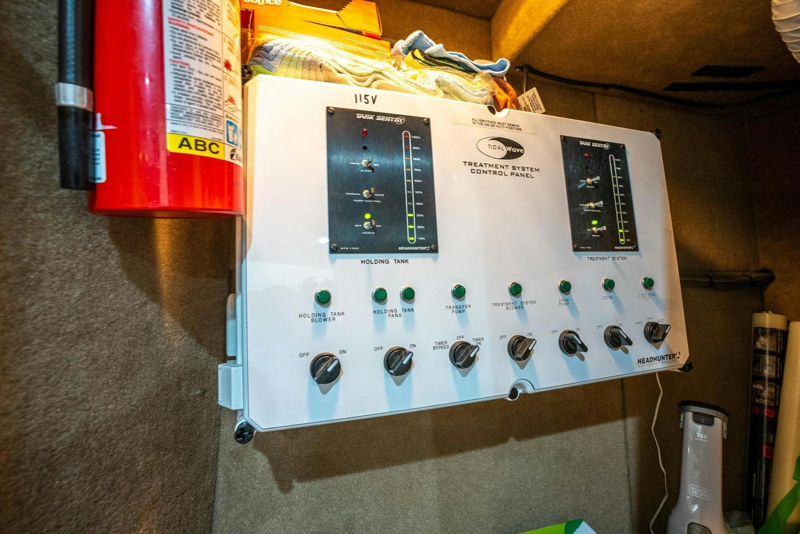 a white electrical box with a black screen and buttons aboard STARFIRE Yacht for Sale